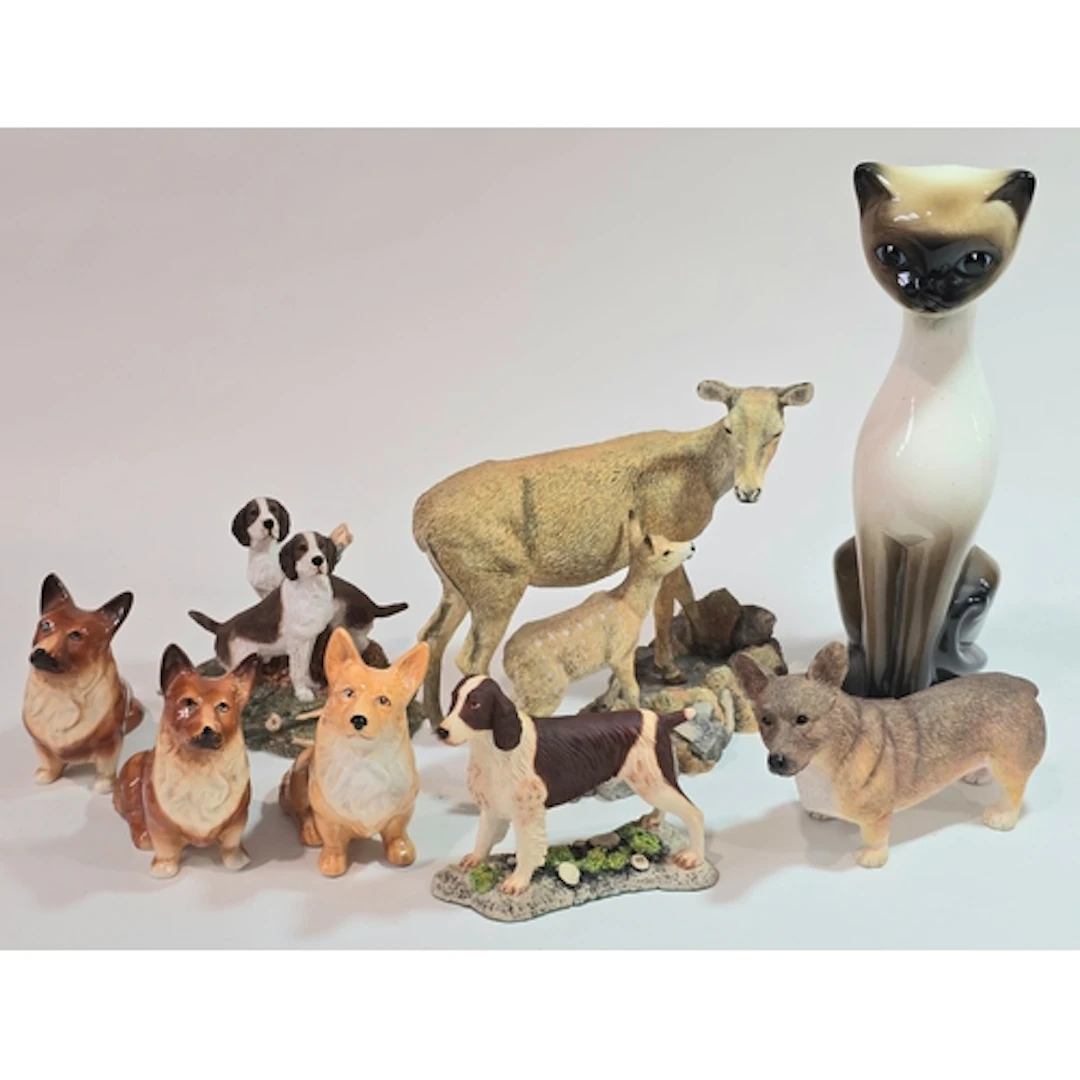 A collection of animal figurines to include a Country Artist...