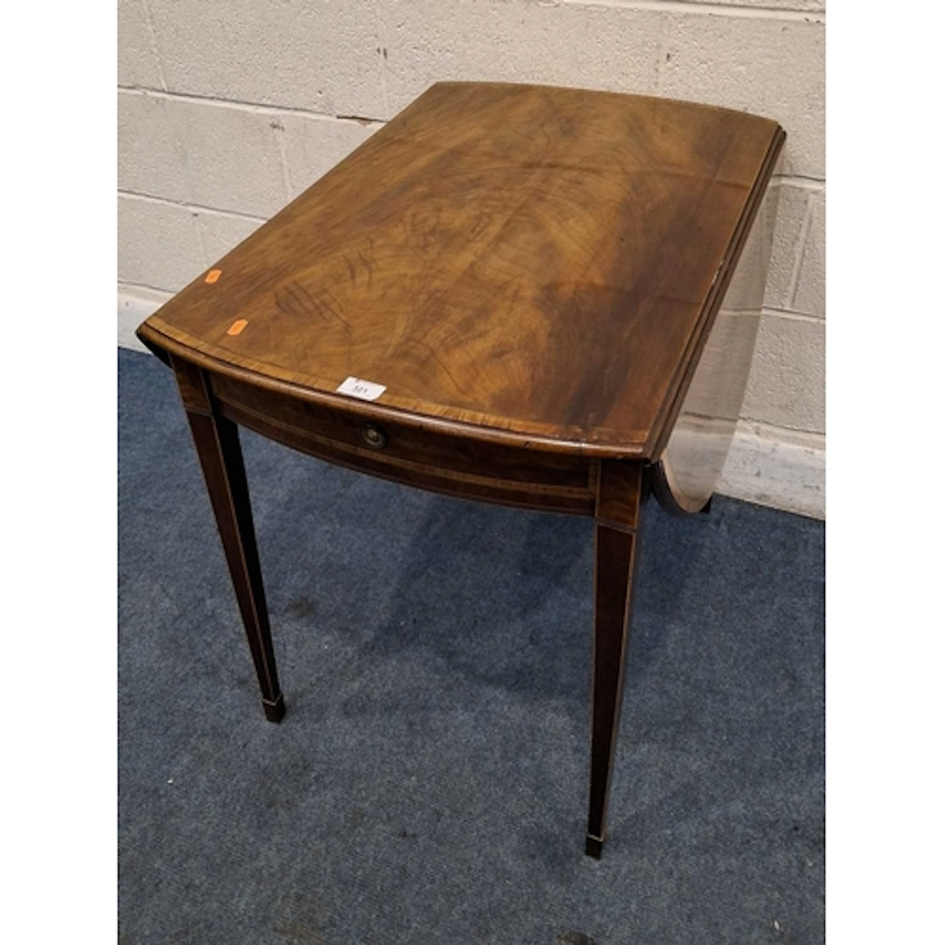 A MAHOGANY DROP LEAF TABLE, with a single frieze drawer and ...