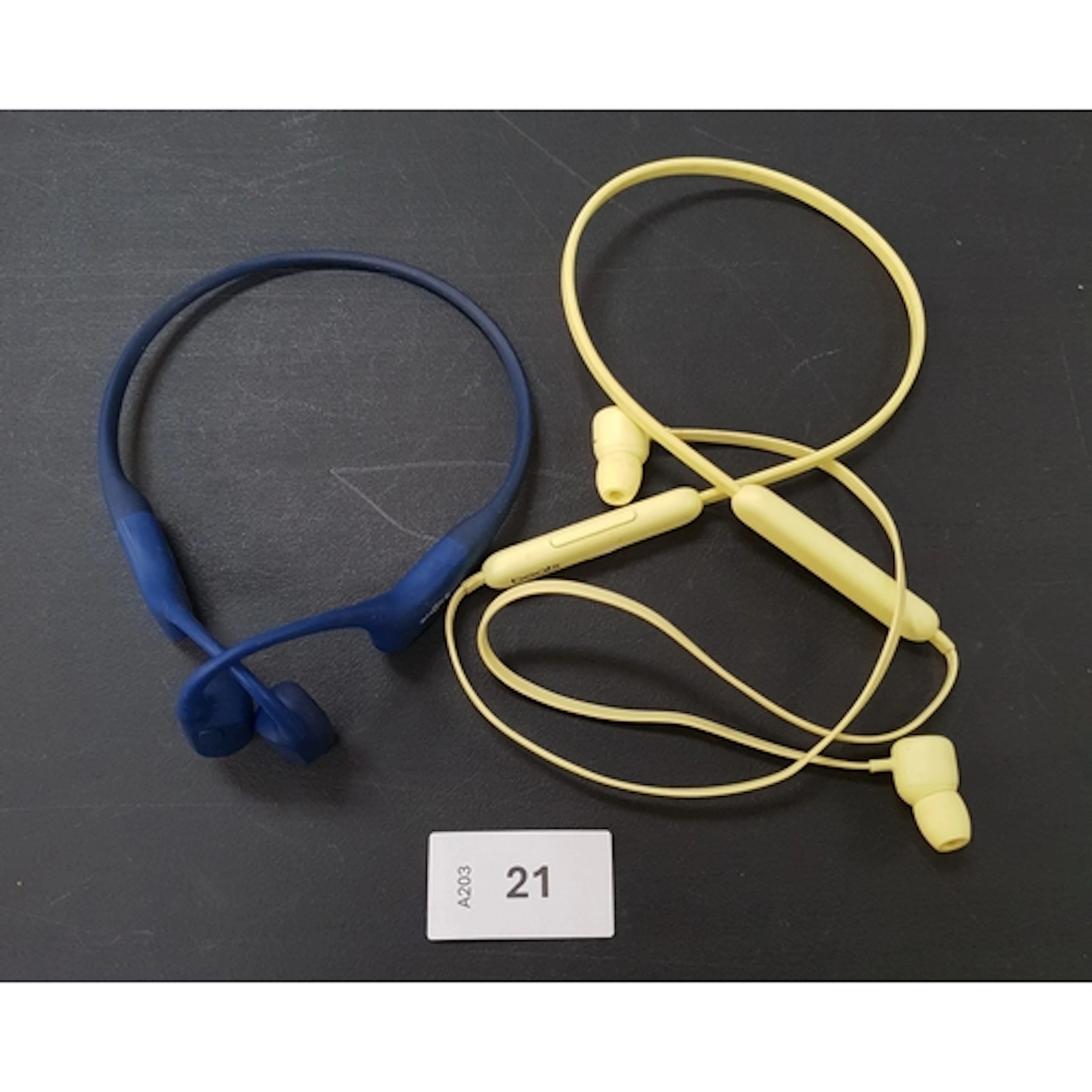 TWO PAIRS OF HEADPHONES including Shokz and Beats