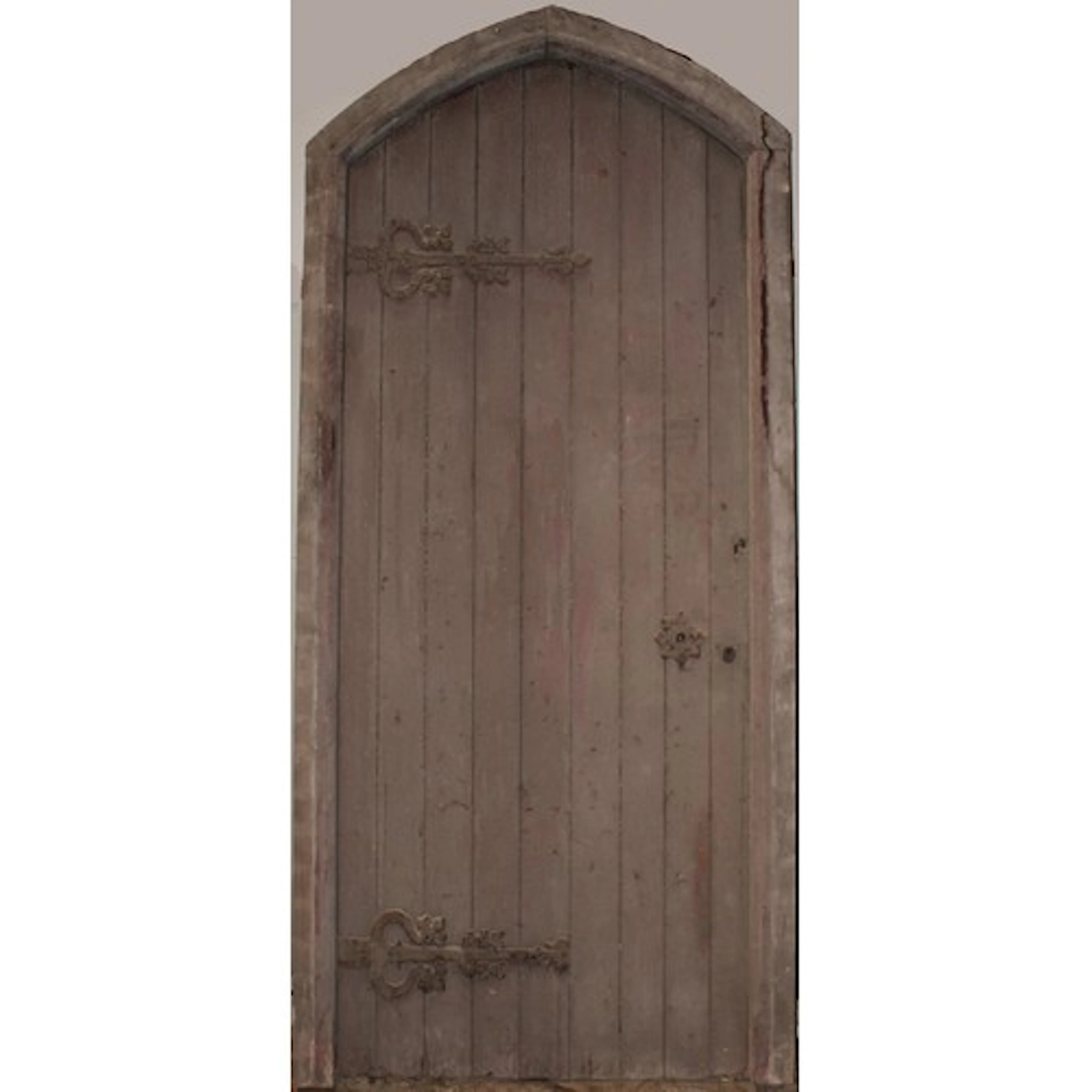 A large Arts & Crafts period pitch pine pointed-arch door an...