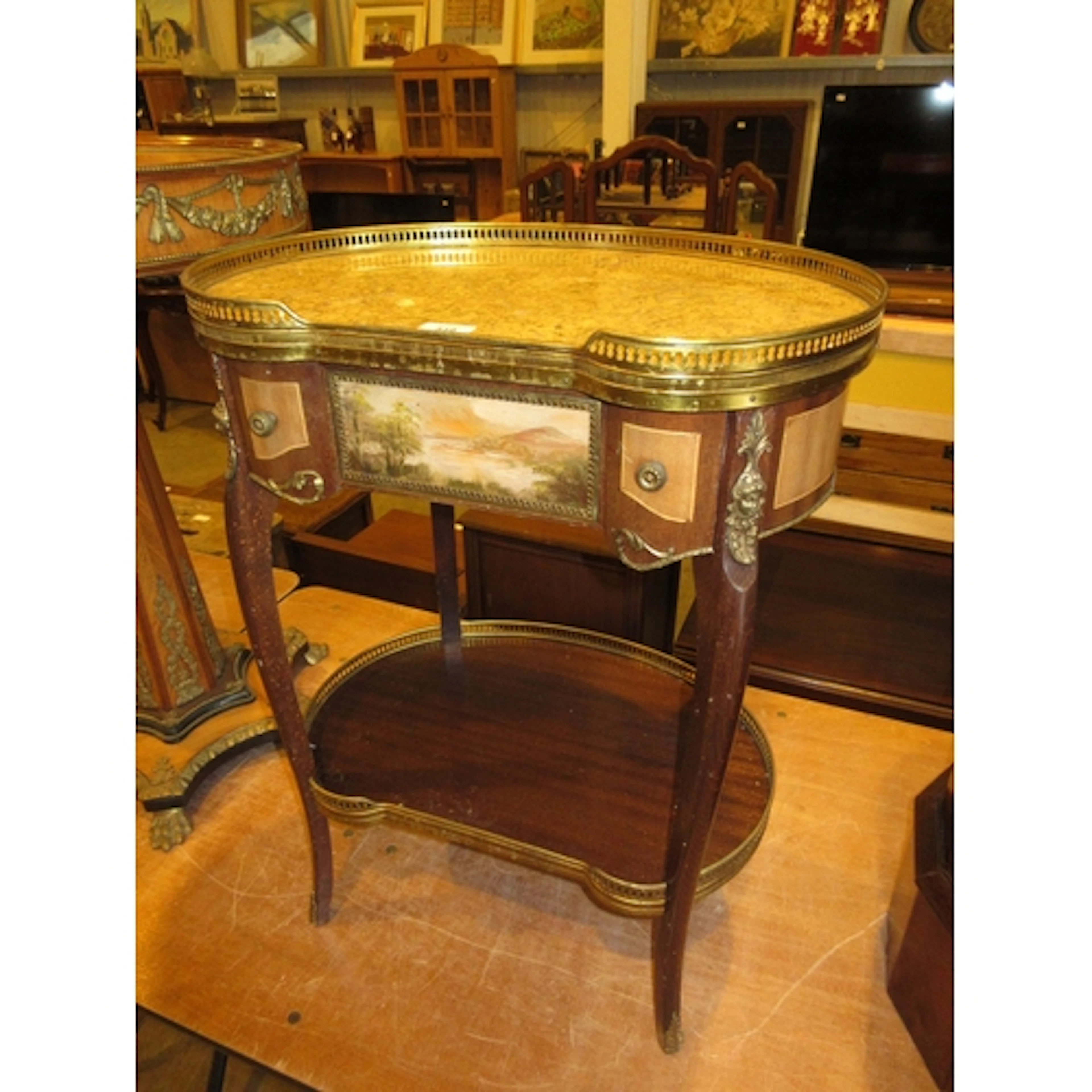 Continental Side Table having a Marble Top, Brass Gallery an...