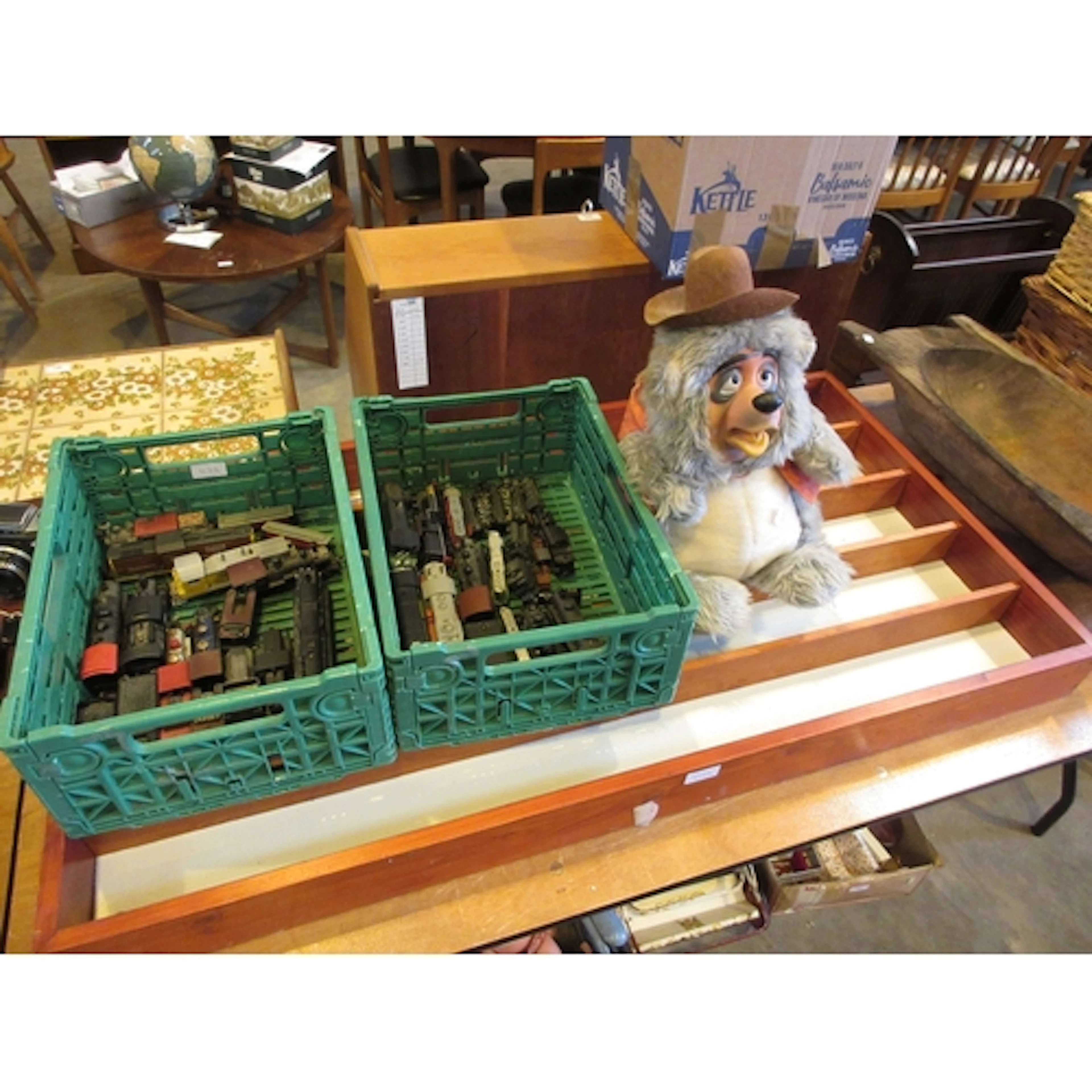 Display Case with Model Trains and Disney Big Al Bear