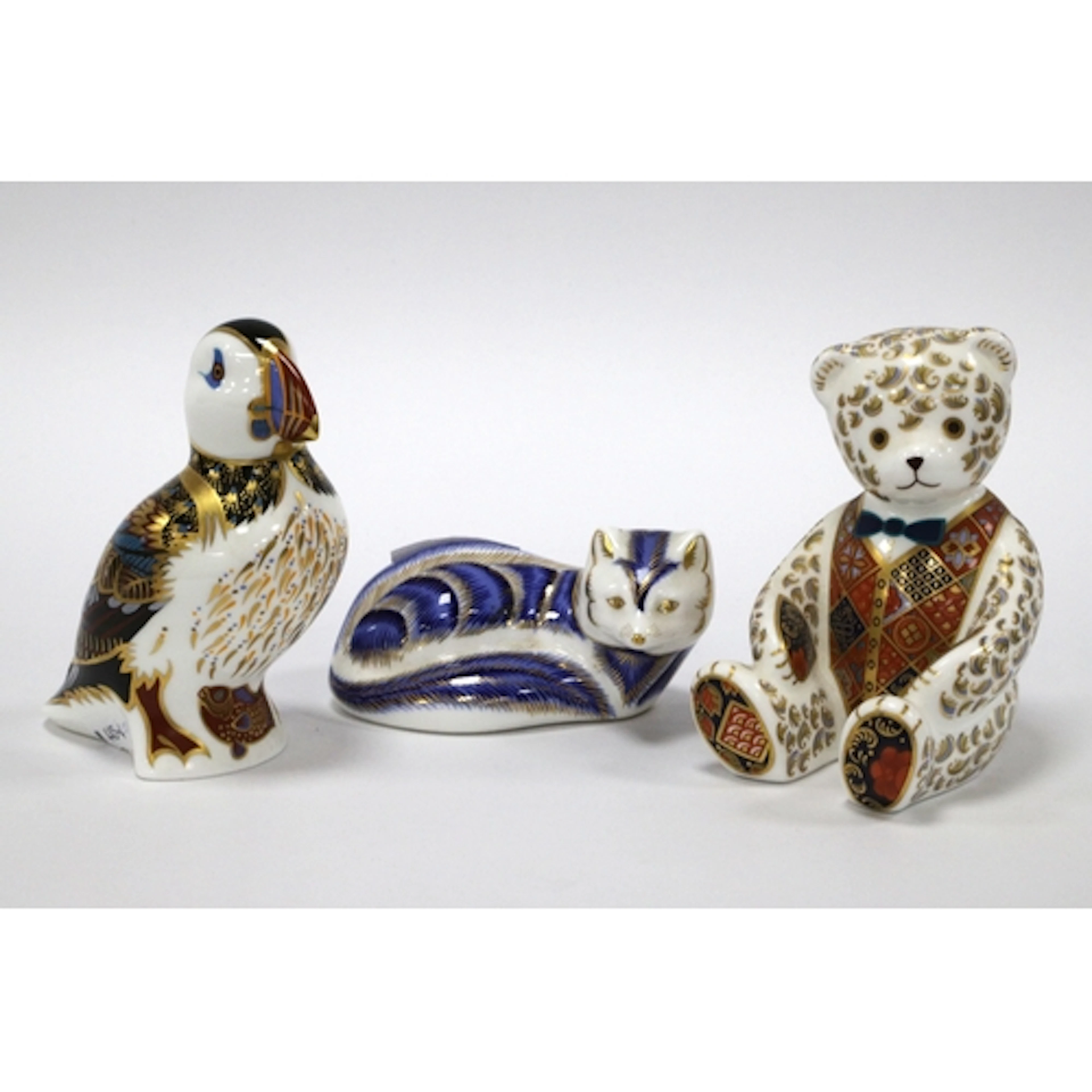 Three Royal Crown Derby Porcelain Paperweights, 'Puffin', 'T...