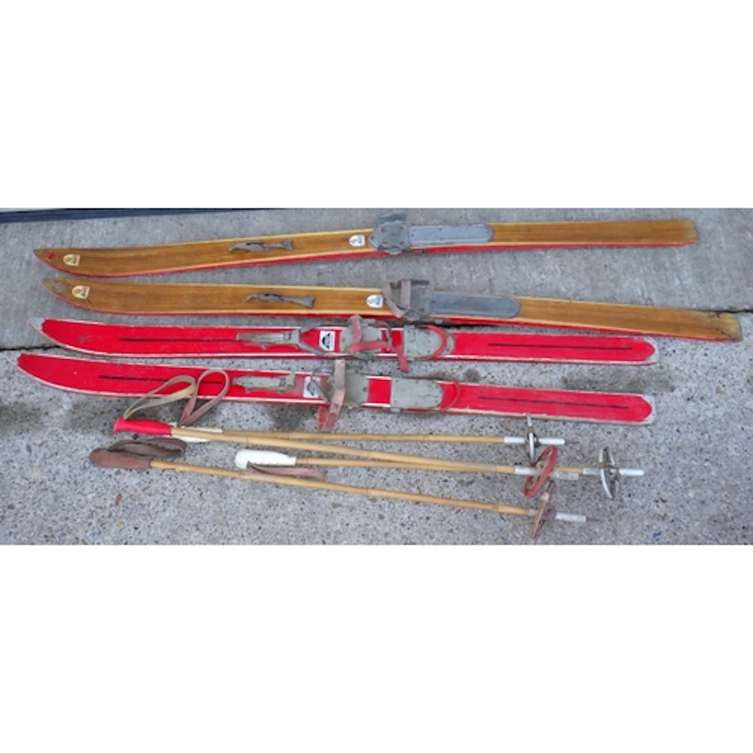 Two pairs of short ski's & poles (a/f) worm