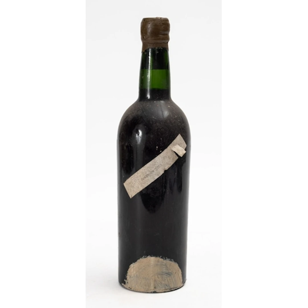 A bottle of Cockburns 1955 vintage Port. lacking label, fill...