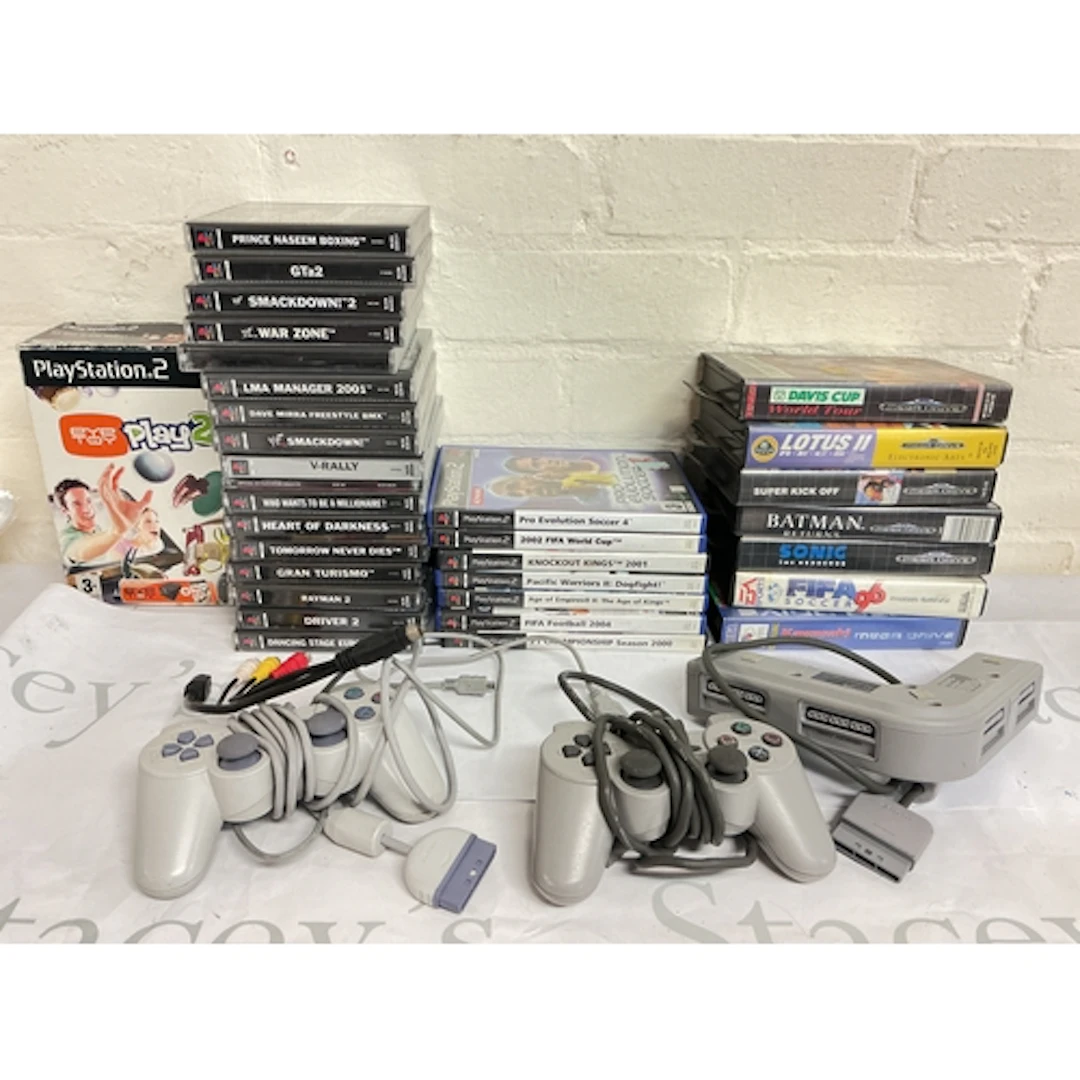 A Collection Of PlayStation 1And 2 Games And Sega Mega Drive...