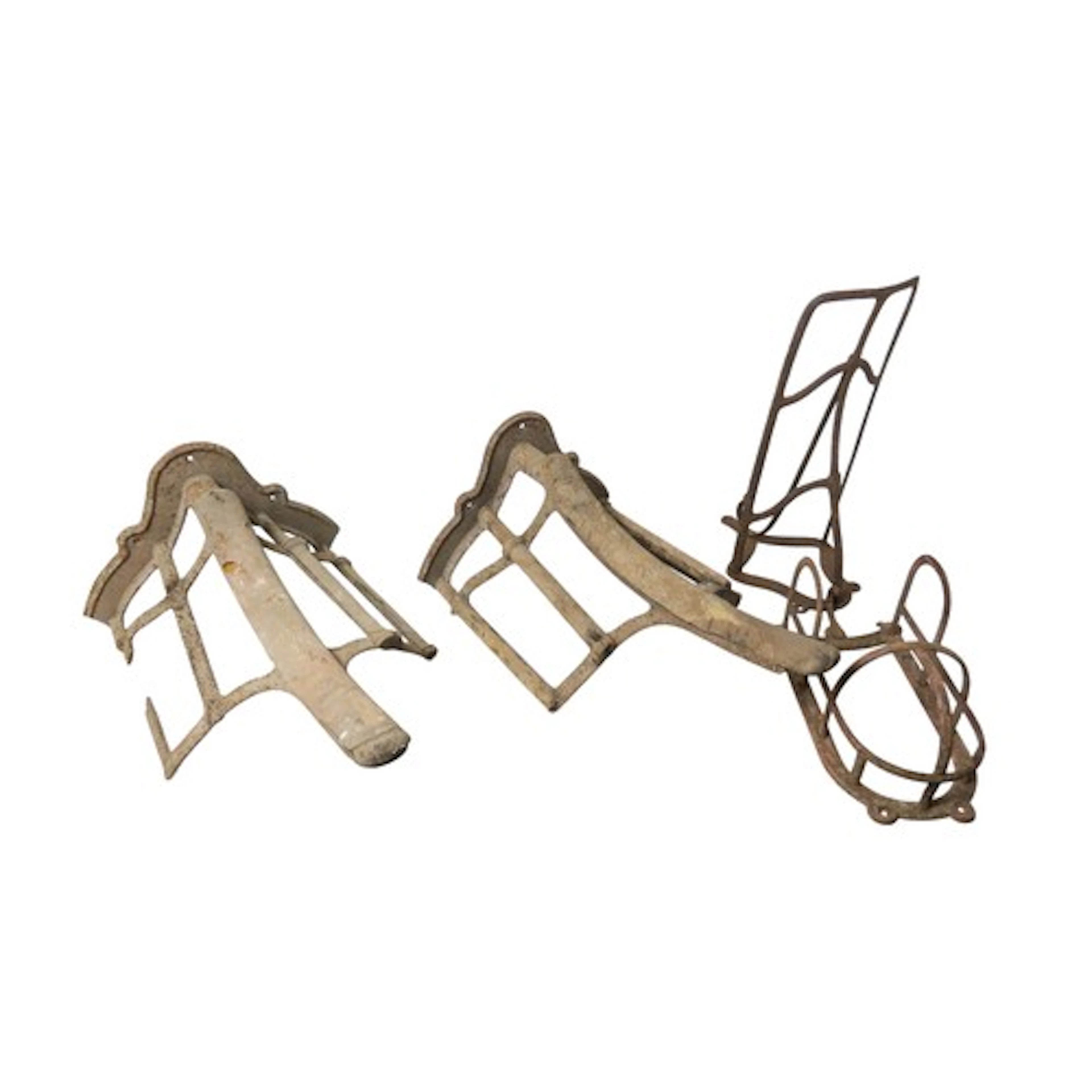 A PAIR OF VINTAGE CAST-IRON SADDLE RACKS EARLY 20TH CENTURY ...