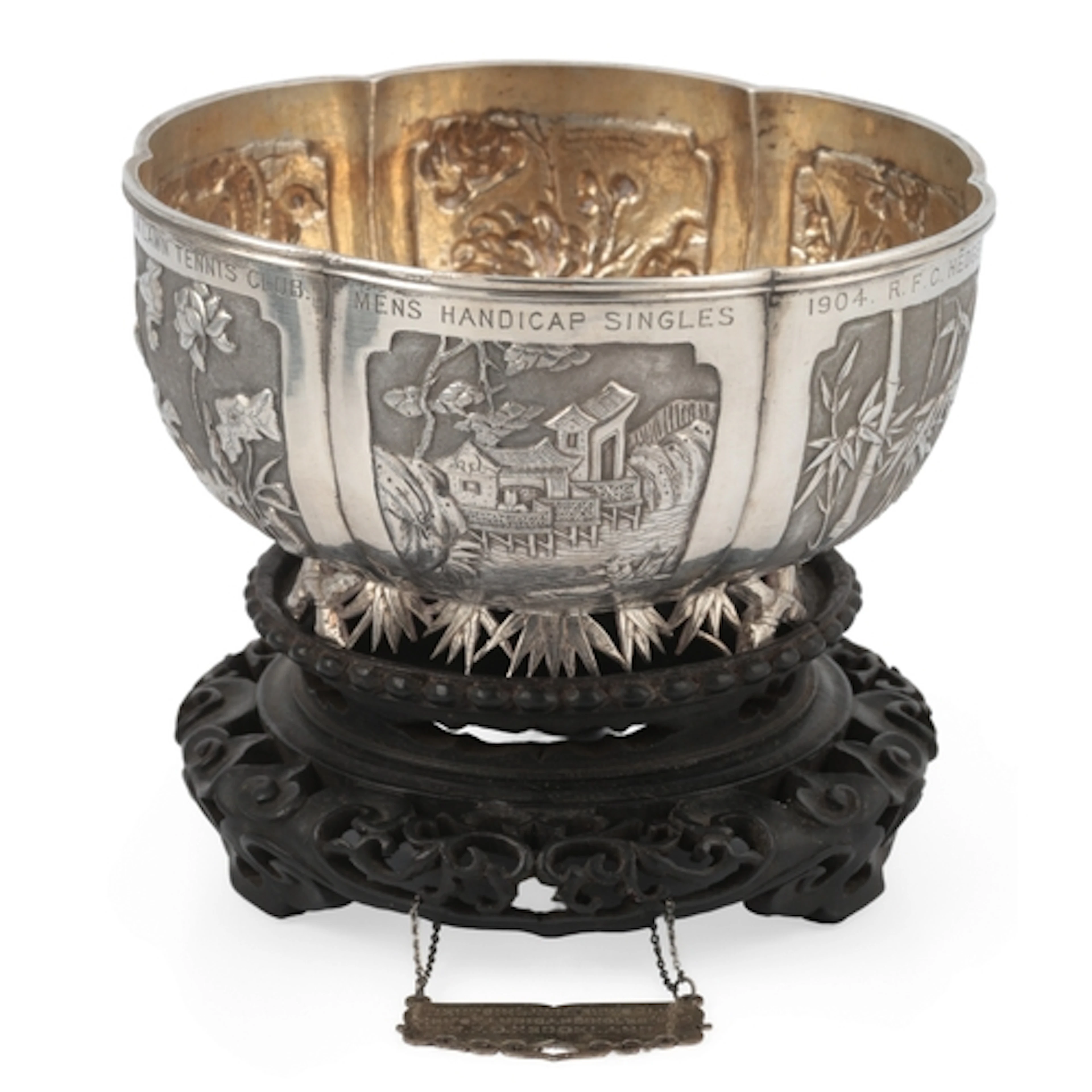 A Chinese presentation silver lobed bowl and a serving spoon...