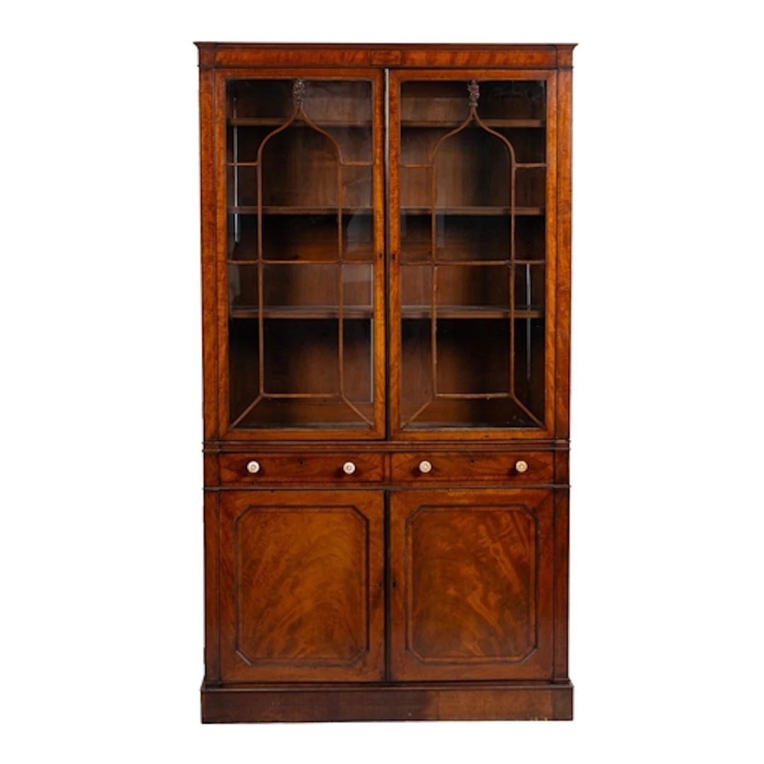 A Regency mahogany and ebony strung library bookcase, early ...