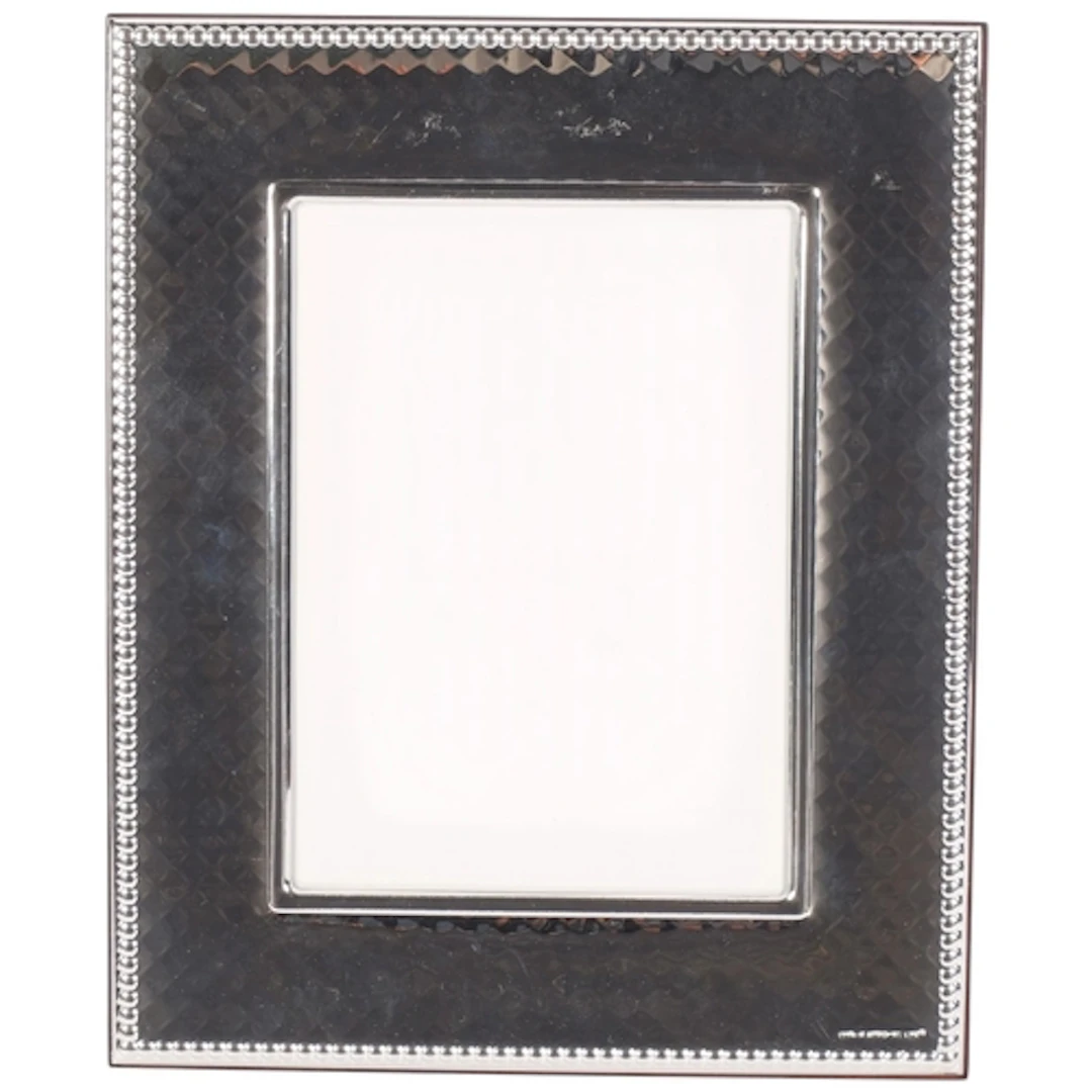 A modern diamond decorated silver-fronted photo frame, with ...