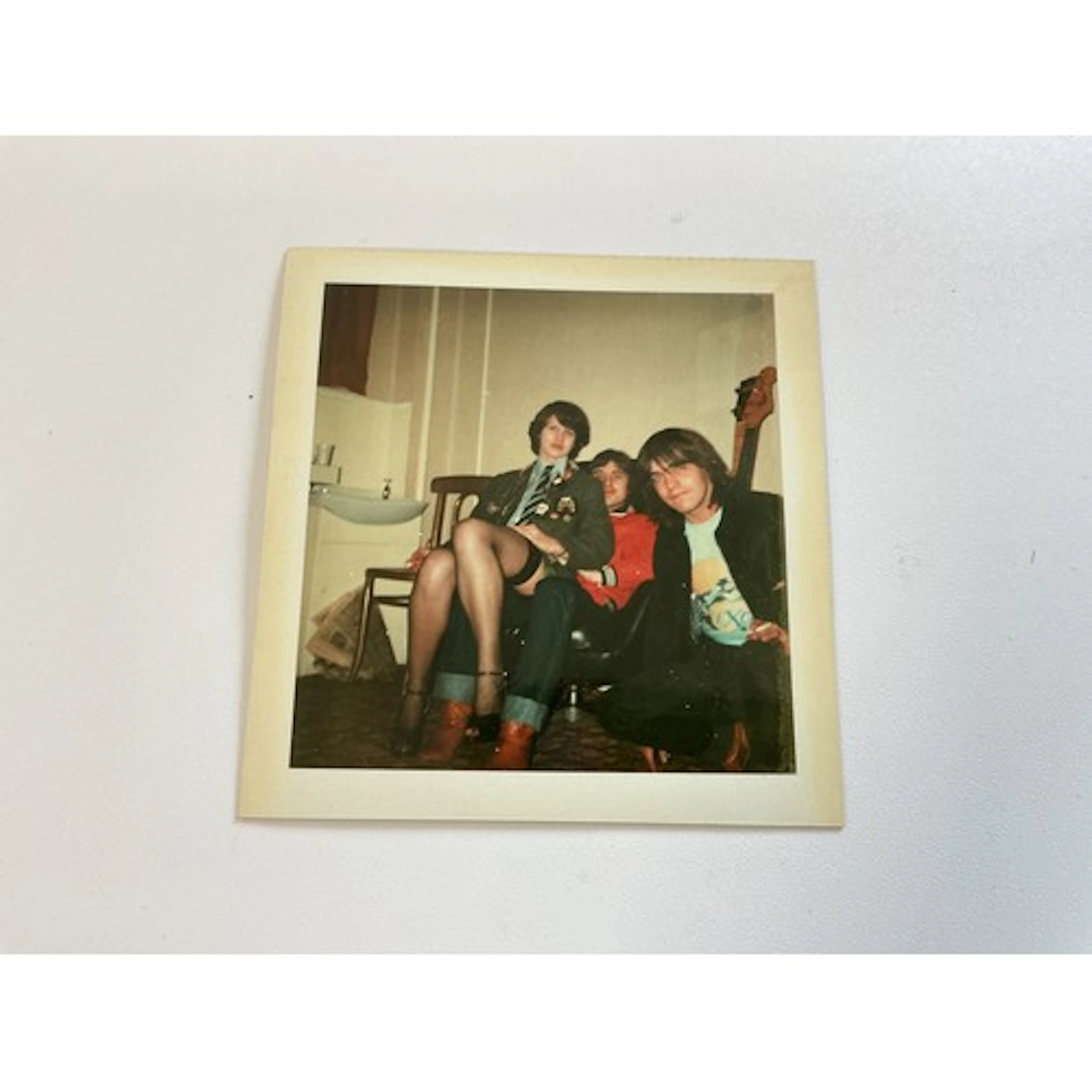 AC/DC interest. A Polaroid photo of Malcolm Young and Phil R...