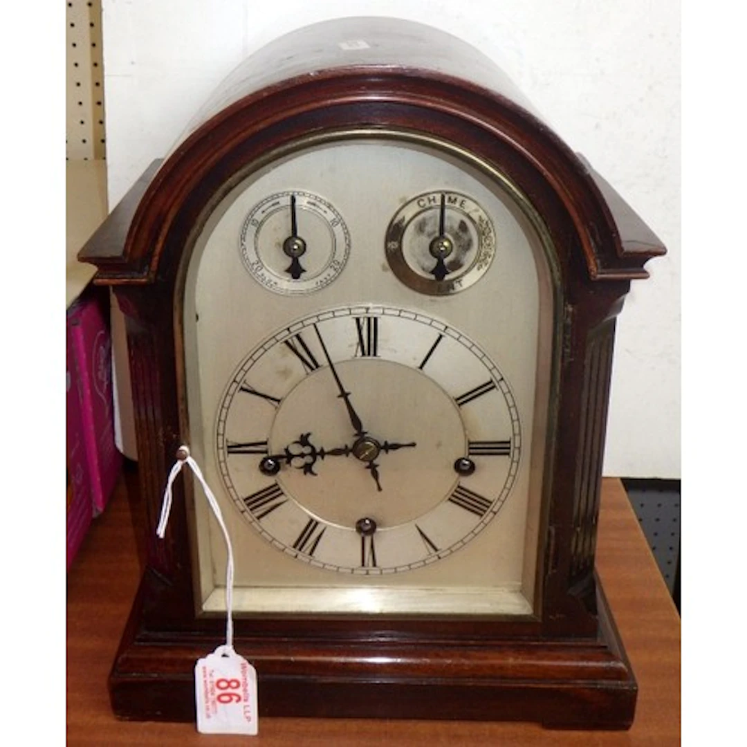 An Edwardian mahogany cased Westminster chime bracket clock