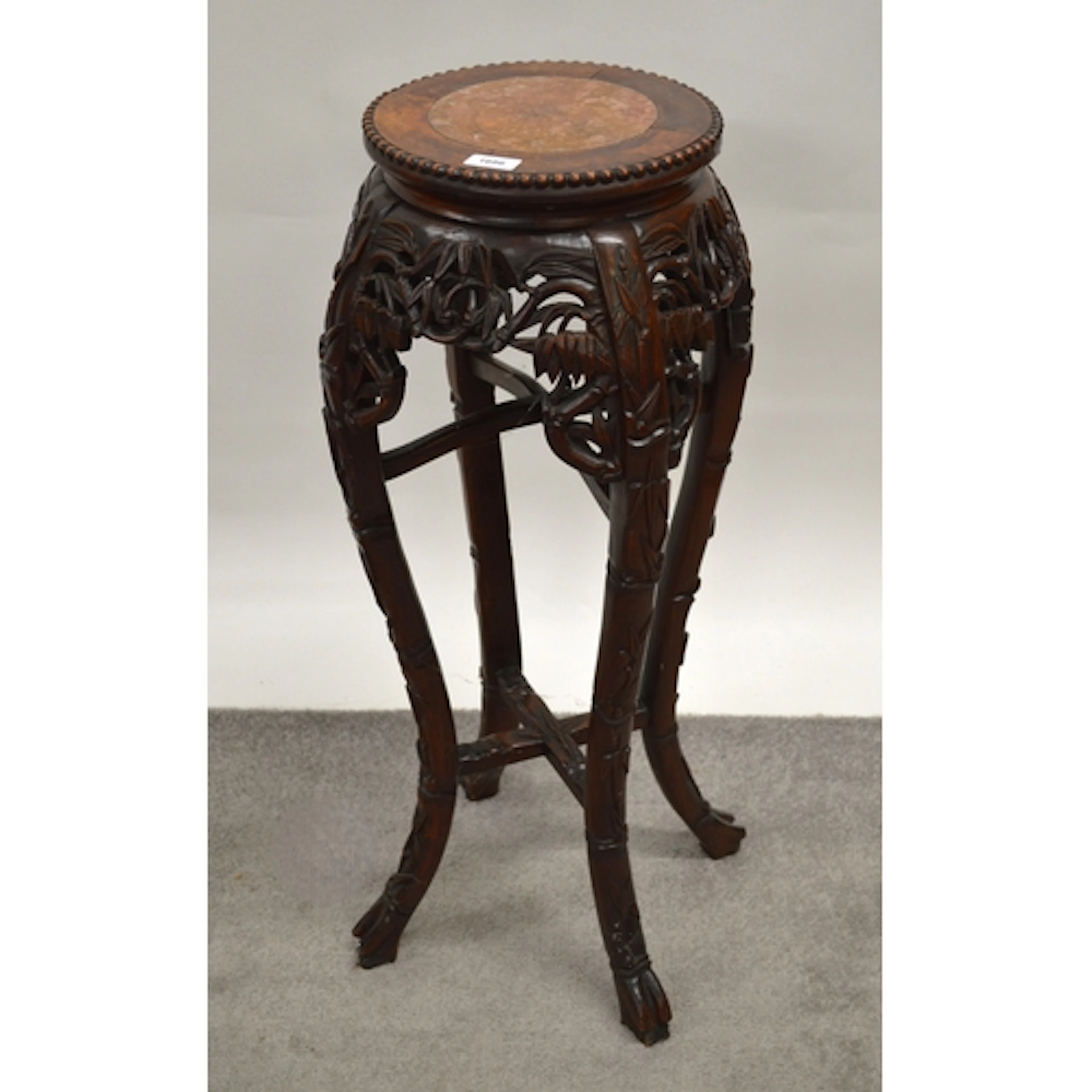 Chinese carved hardwood vase stand, with a marble inset top,...