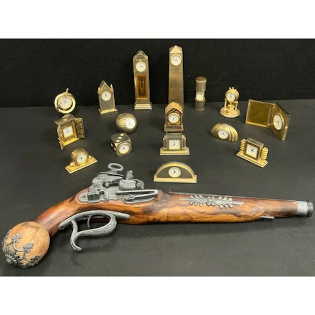 Miniature clocks including a long case, six sided dice, dome...