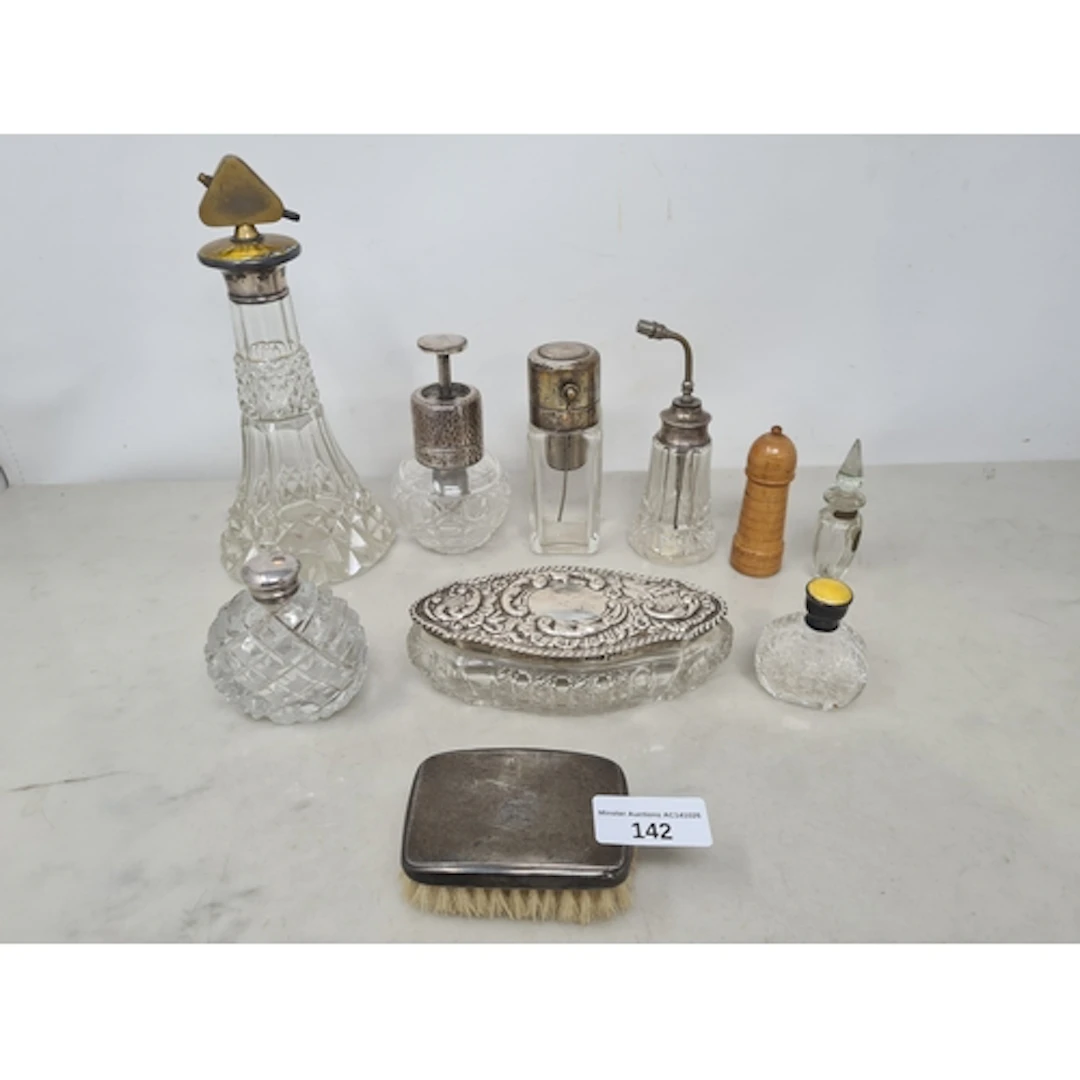 Four silver mounted glass Scent Bottles with atomisers, a la...