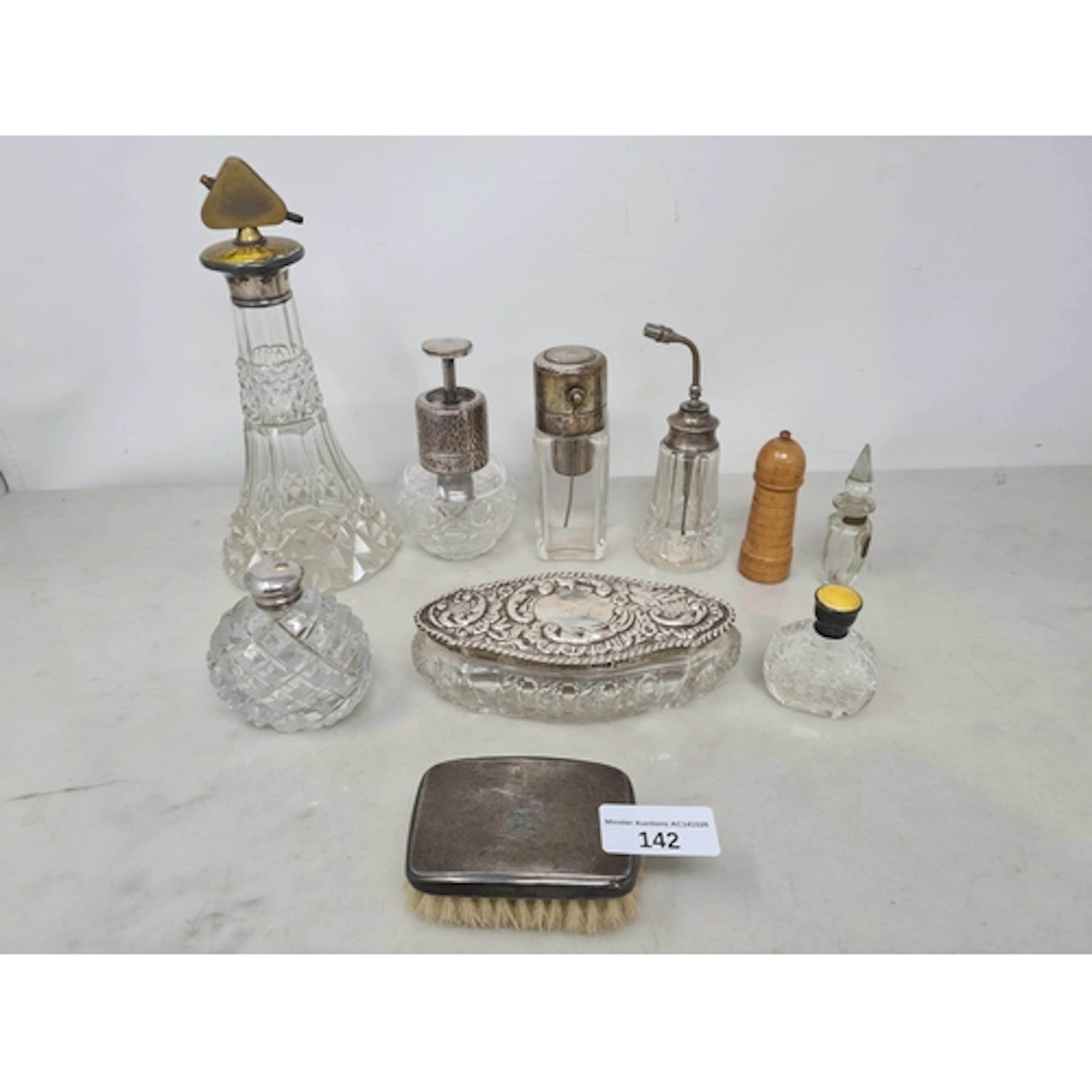 Four silver mounted glass Scent Bottles with atomisers, a la...