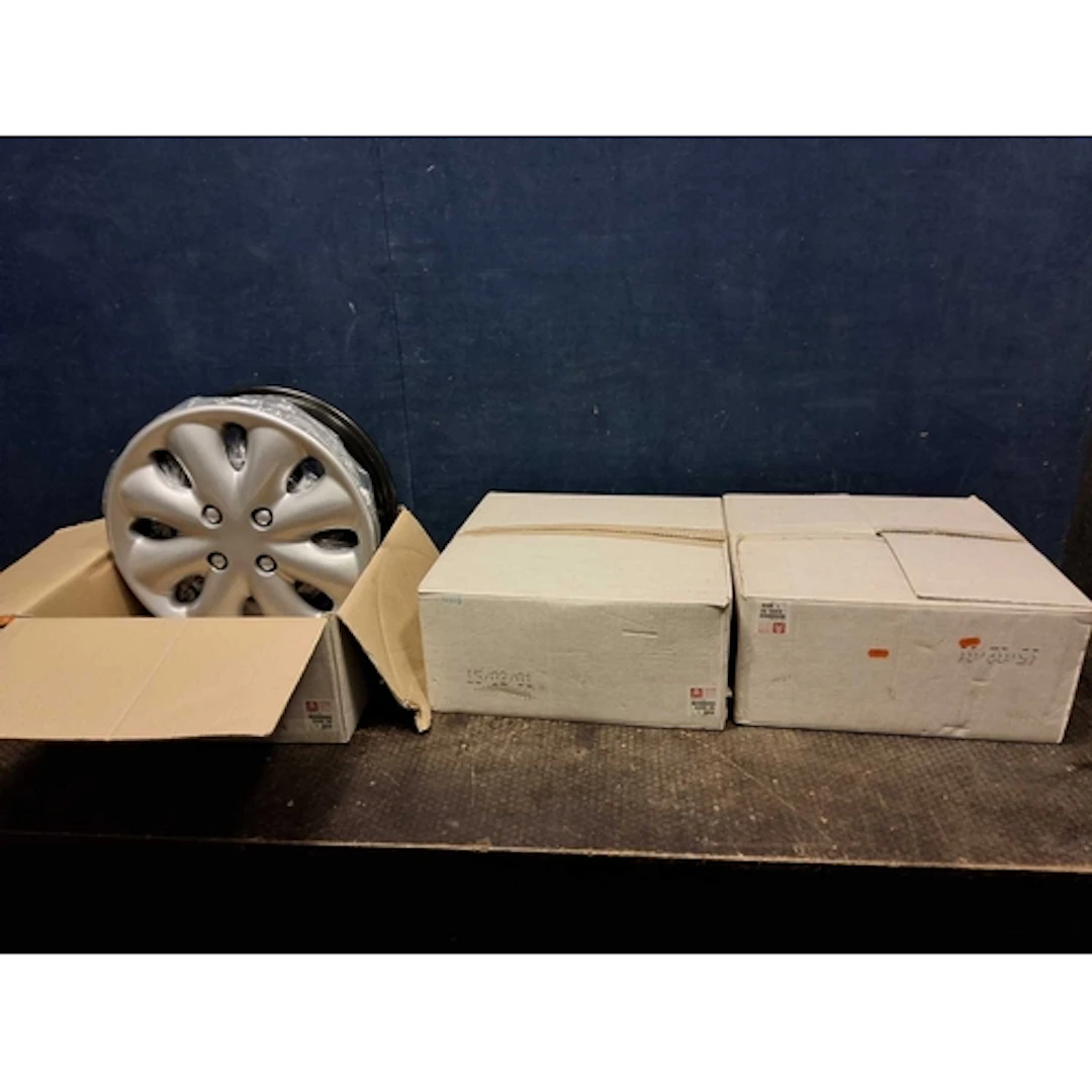 THREE BOXED AND NEARLY NEW CITROEN STEEL WHEELS with plastic...