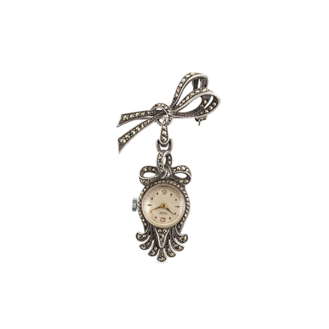A 1950's SILVER FOB WATCH, marcasite finish with bow detail,...