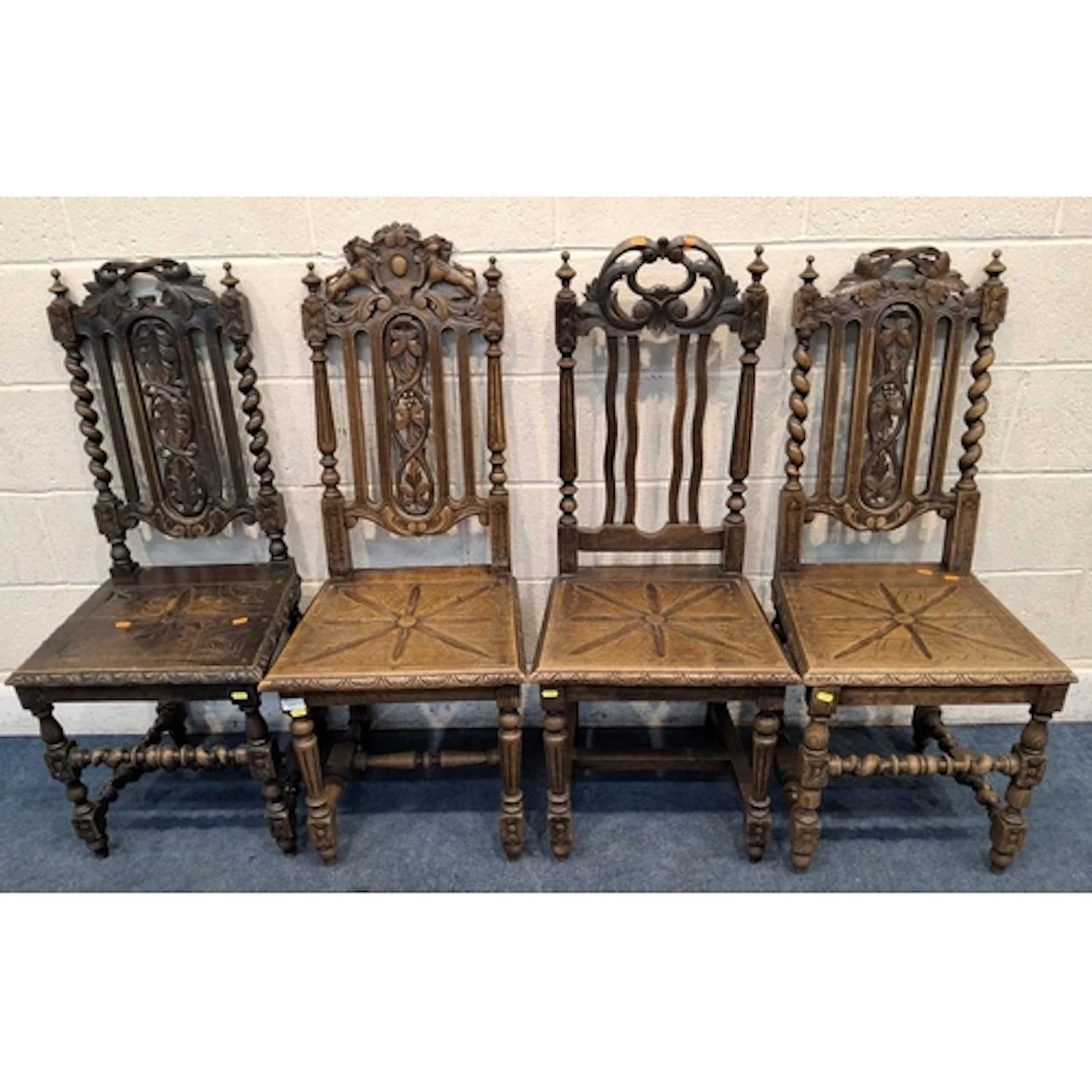 FOUR EARLY 20TH CENTURY OAK CHAIRS, with various carvings, s...