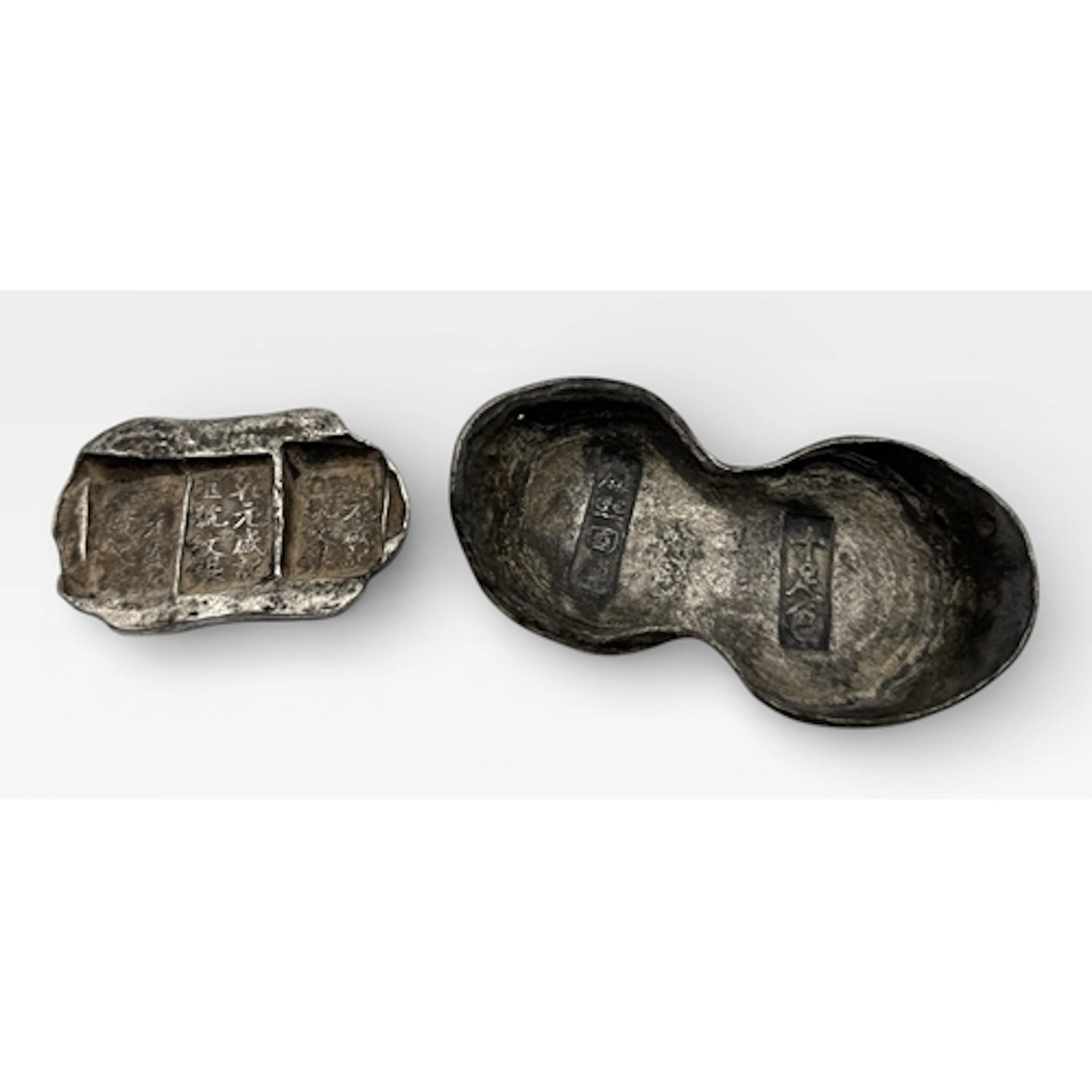TWO CHINESE SILVER BULLIONS Total weight: 550gms...