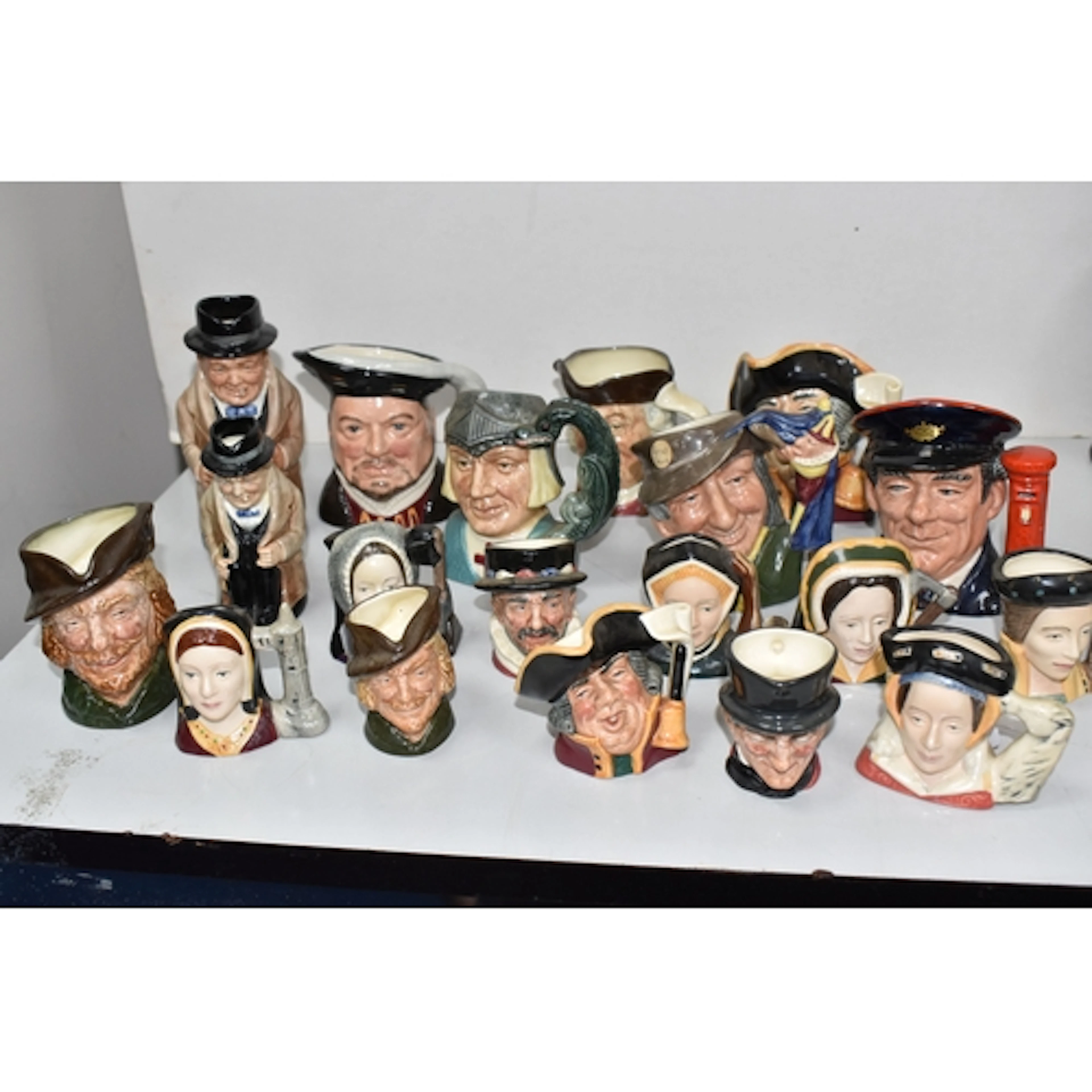 A GROUP OF NINETEEN ROYAL DOULTON CHARACTER/TOBY JUGS in sma...