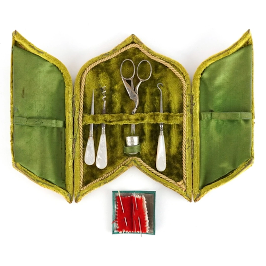 Victorian velvet and silk lined sewing case with tools, some...