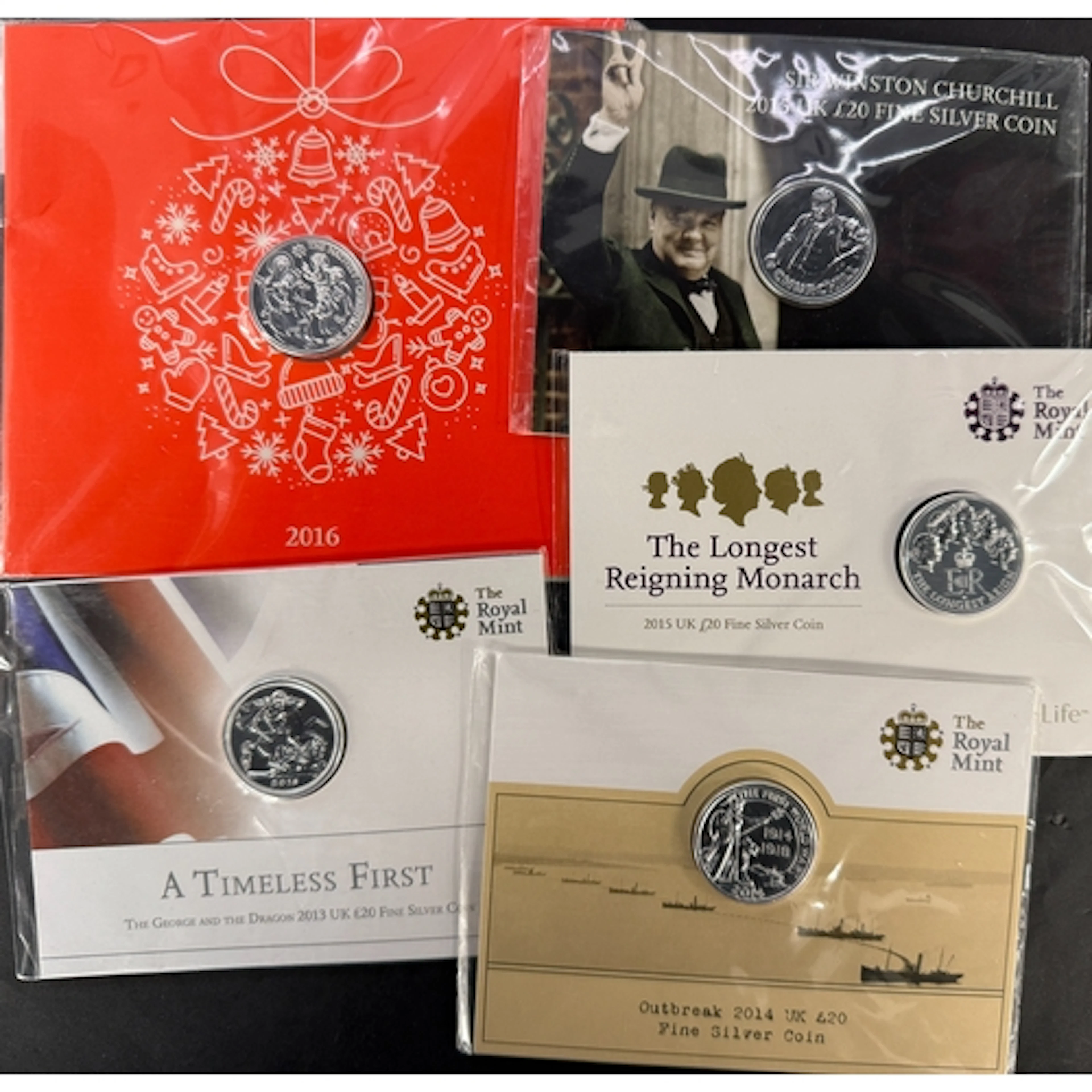 A group of five UK QEII brilliant uncirculated fine silver £...