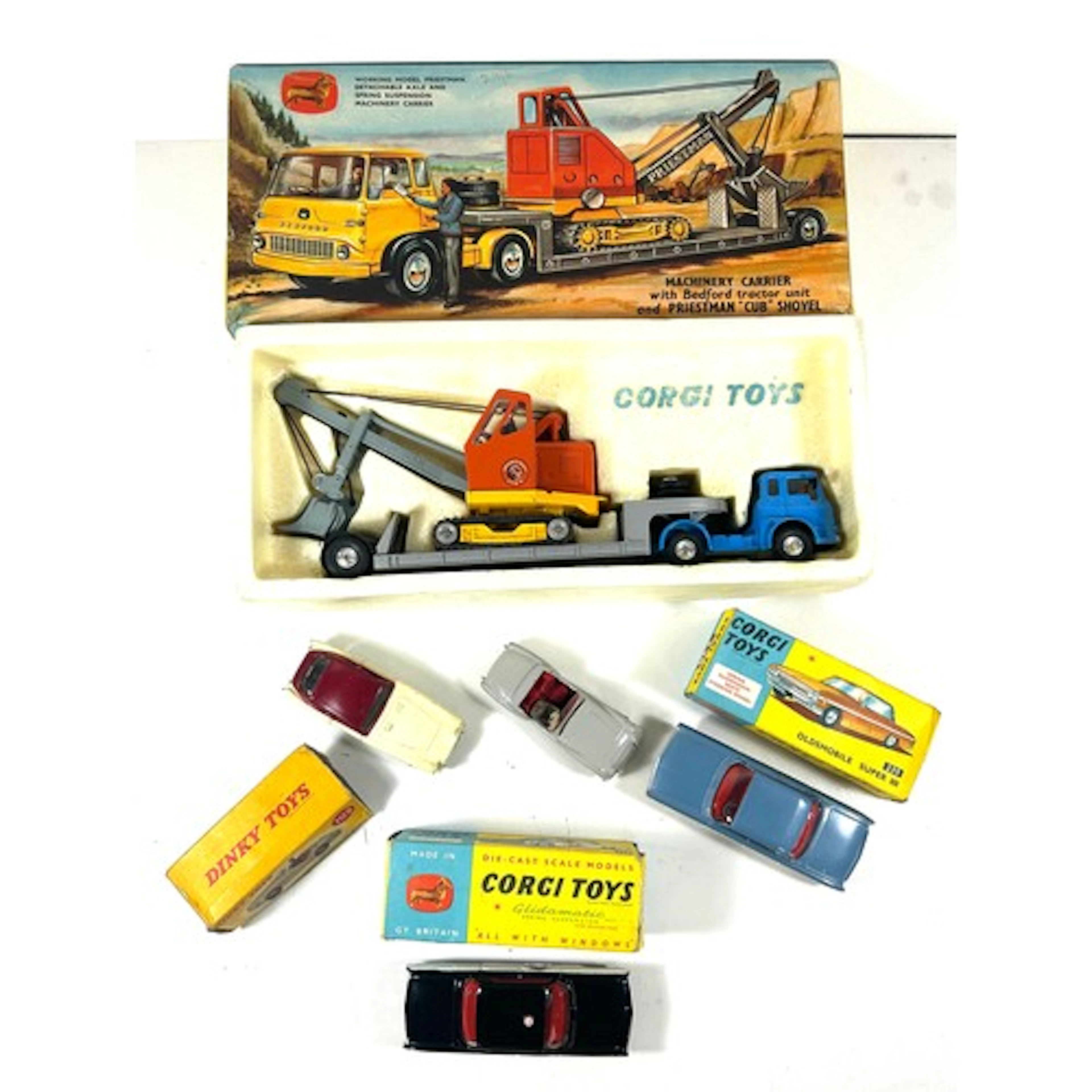3 Corgi Toys. Oldsmobile "SHERIFF" Car (237). In black and w...