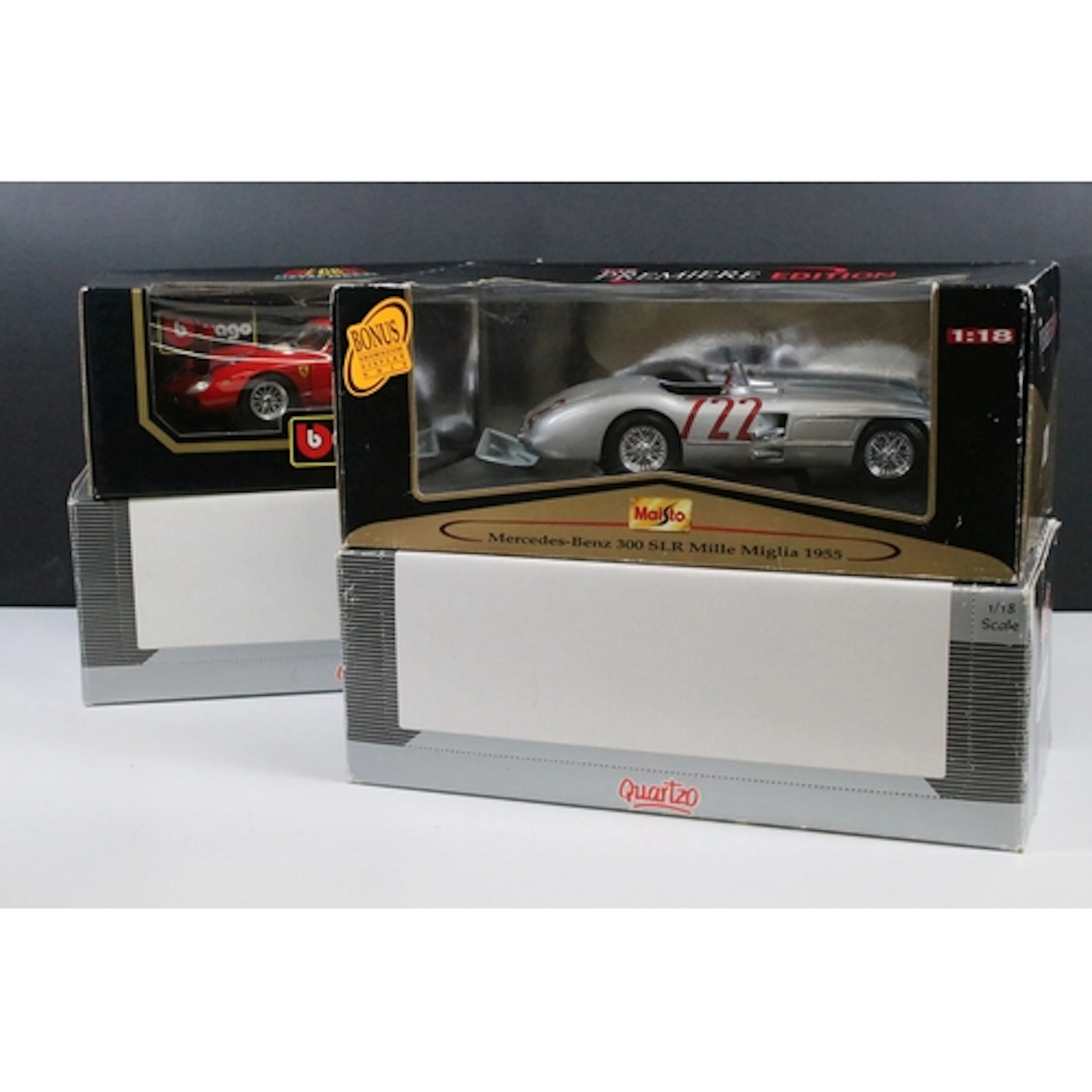 Four boxed 1/18 diecast models to include 2 x Quartzo Classi...