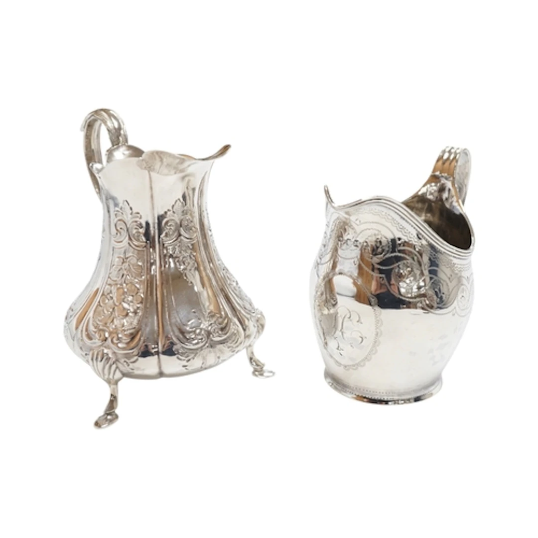 A George III engraved silver helmet shaped cream jug, by Pet...