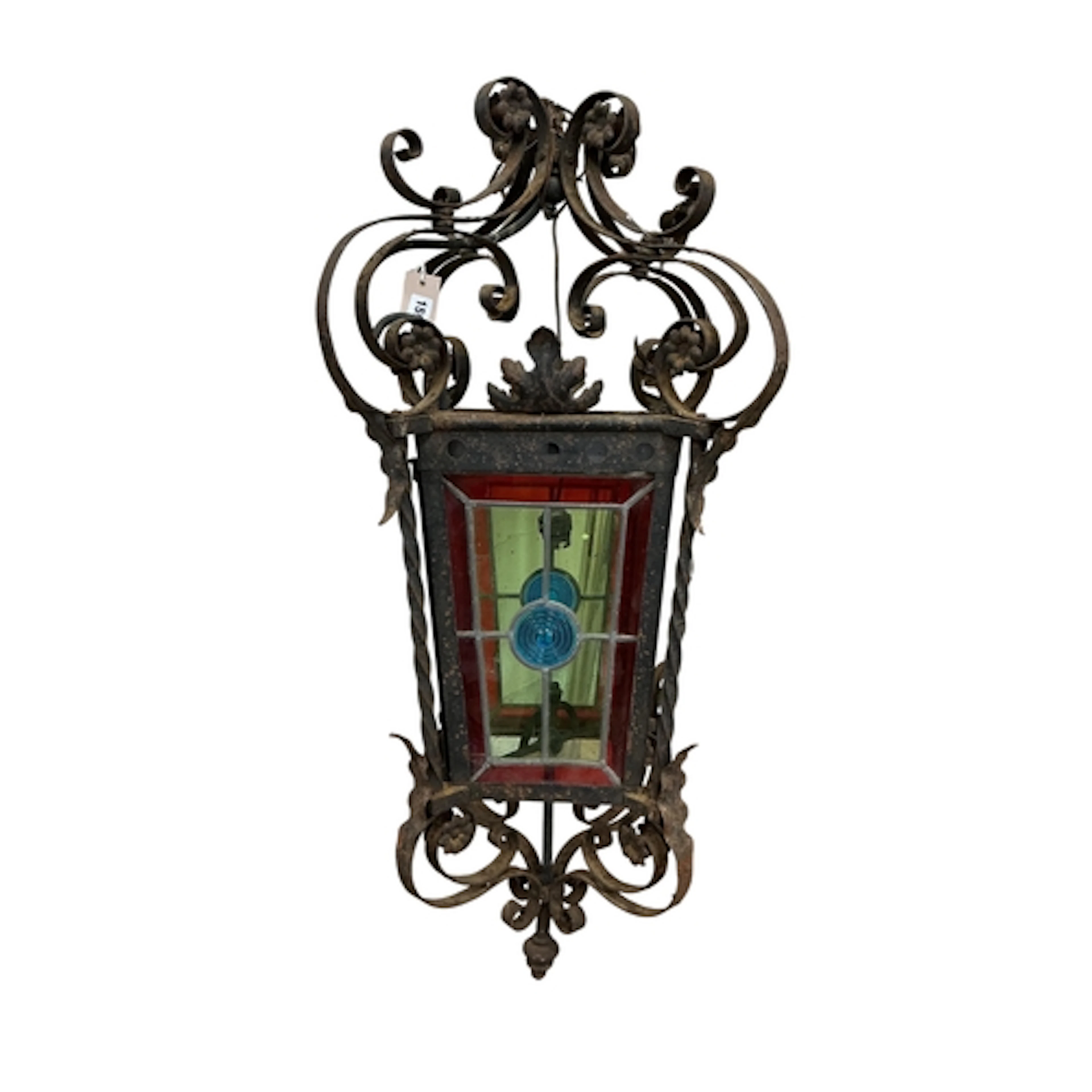 An early 20th century wrought iron and stained glass hanging...