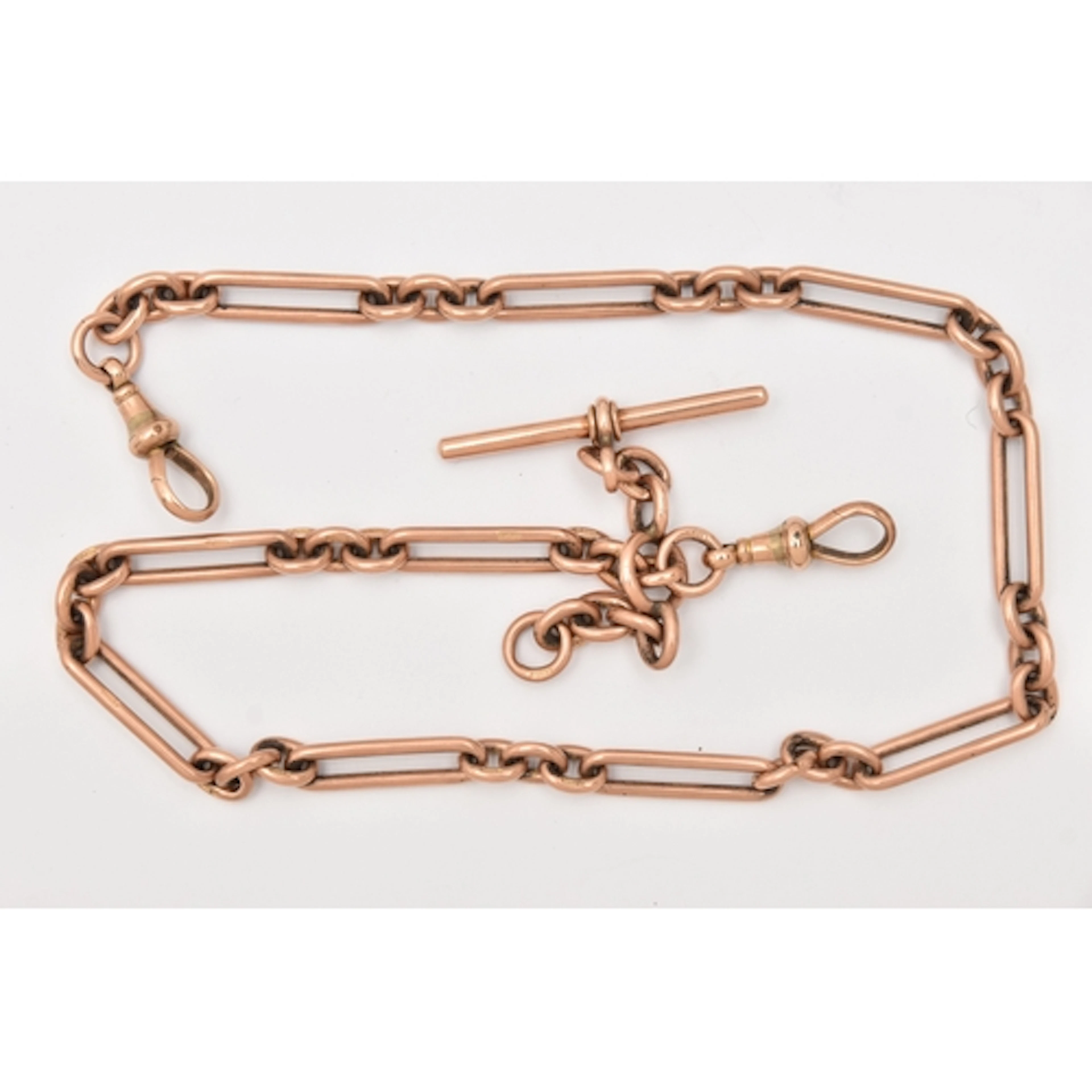 A 9CT ROSE GOLD DOUBLE FETTER LINK ALBERT CHAIN, each link s...