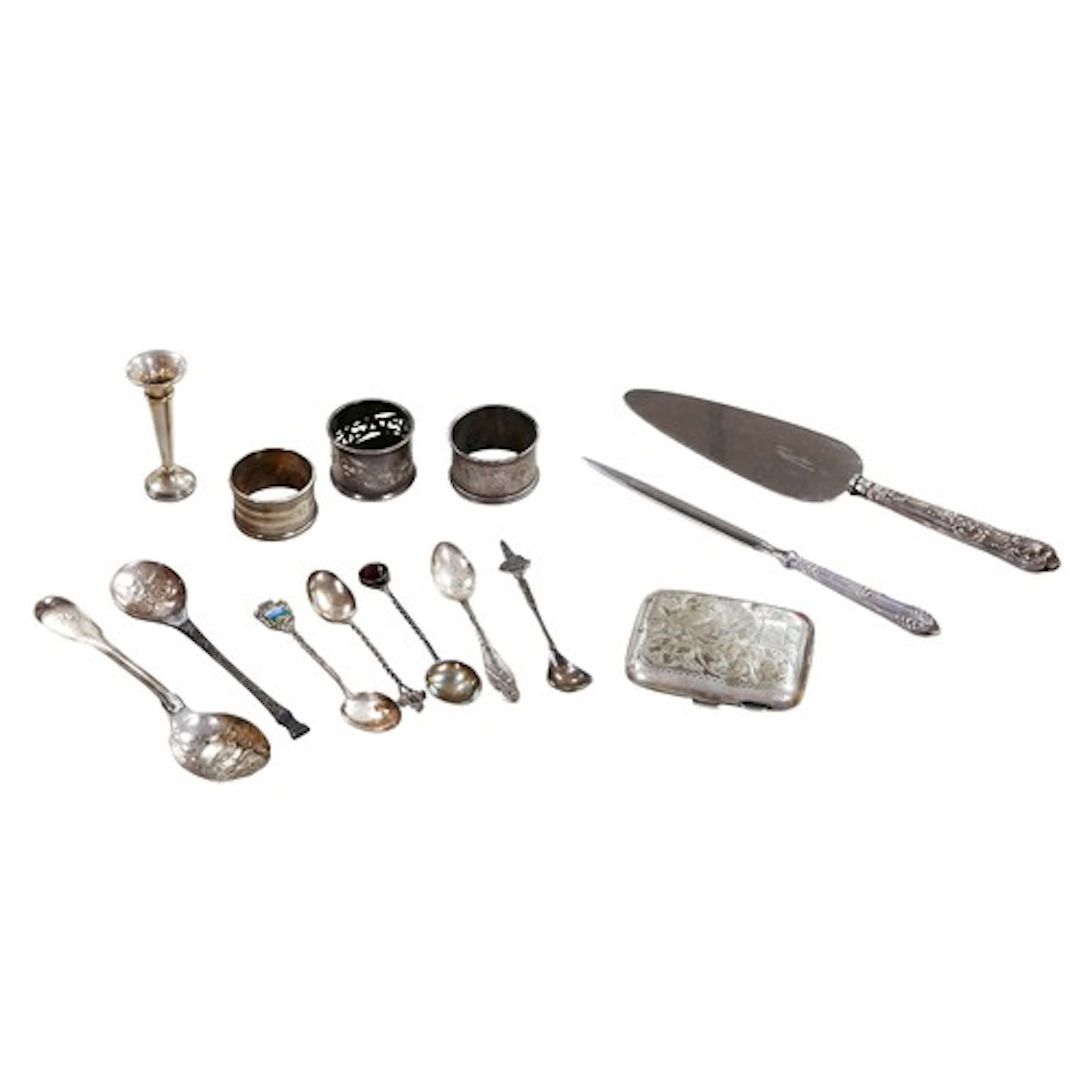A quantity of assorted silver items to include silver cigare...