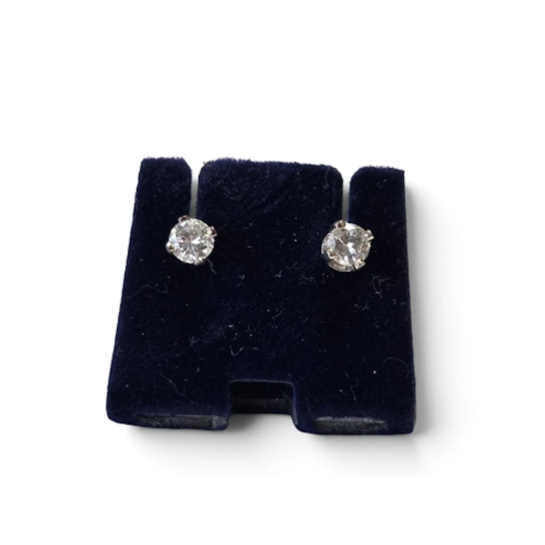 A lovely pair of 9ct White Gold and Diamond stud Earrings ap...