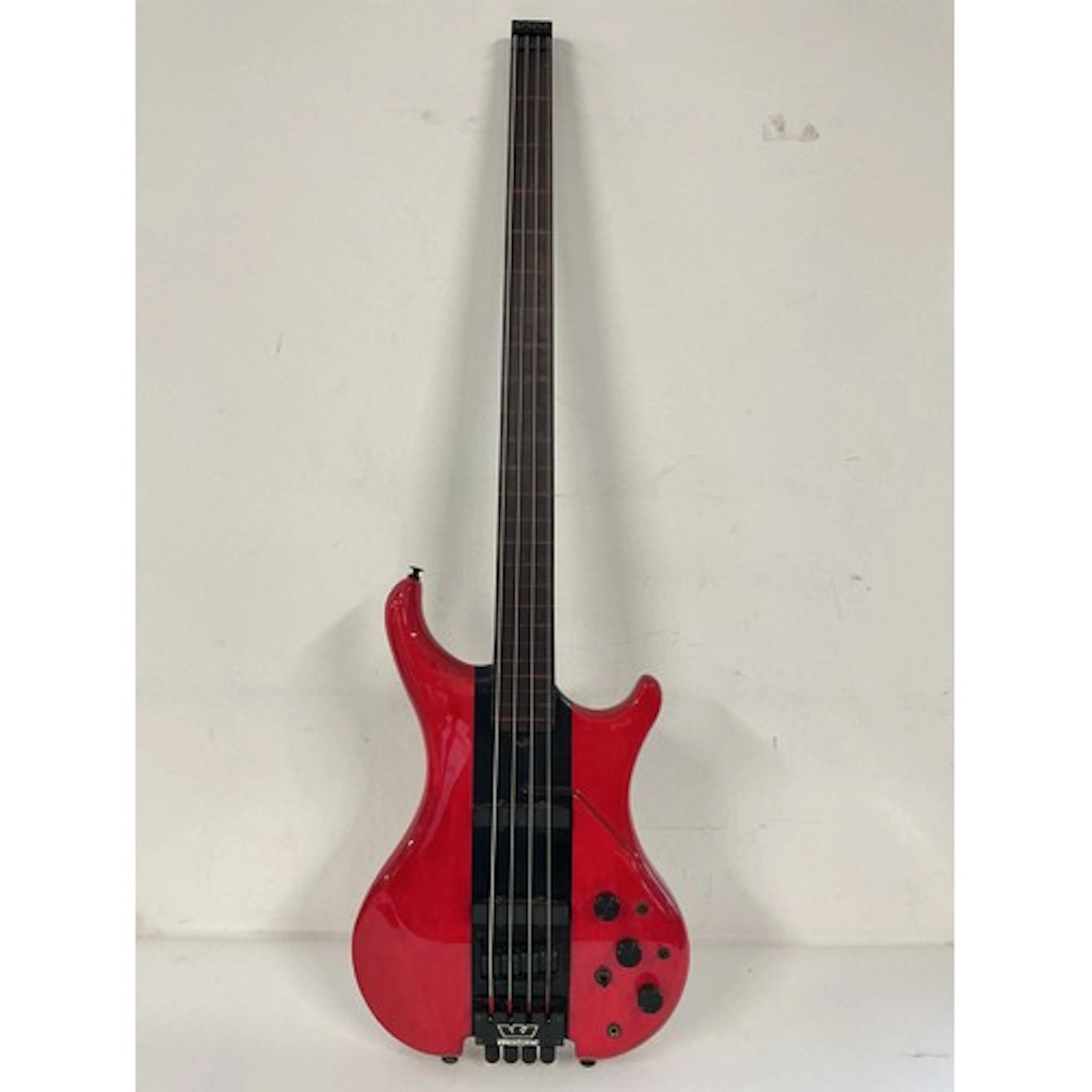 A Westone fretless and headless super bass guitar. Comes wit...