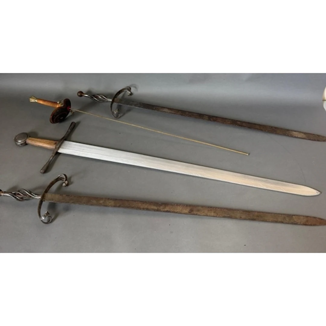 A selection of four swords, various styles.