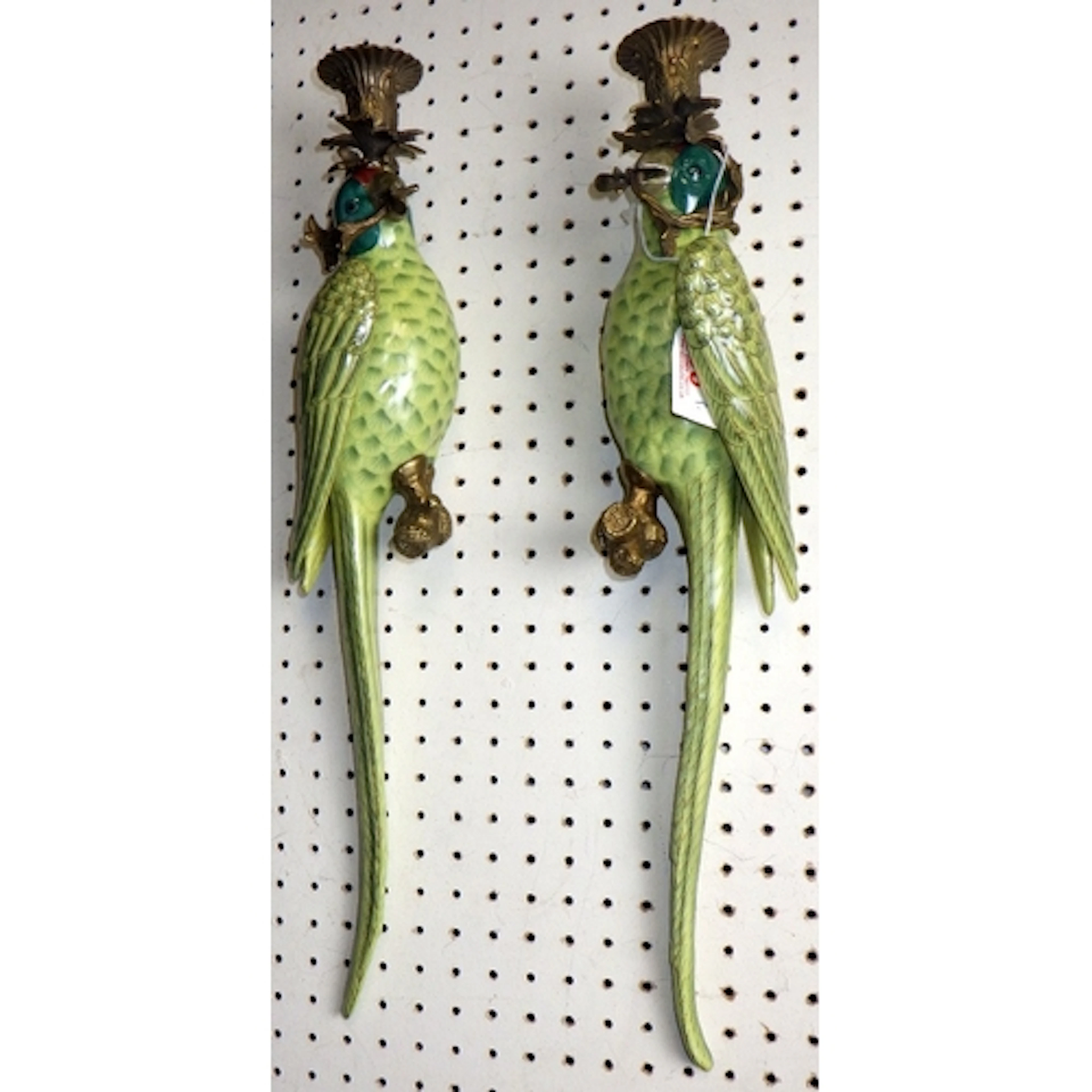 A pair of ceramic and bronze parrot wall sconces