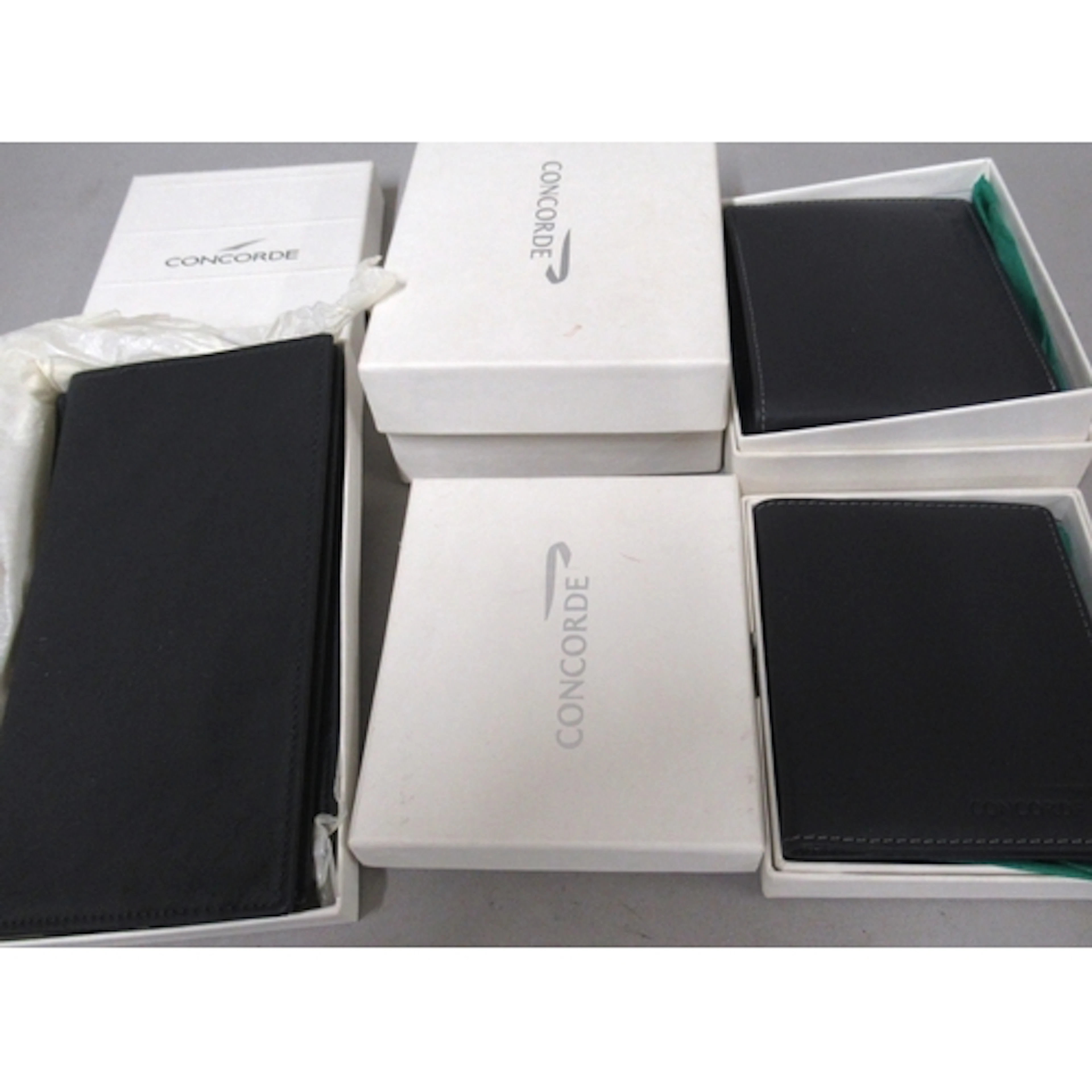 Group of six various Concorde souvenir wallets, credit card ...