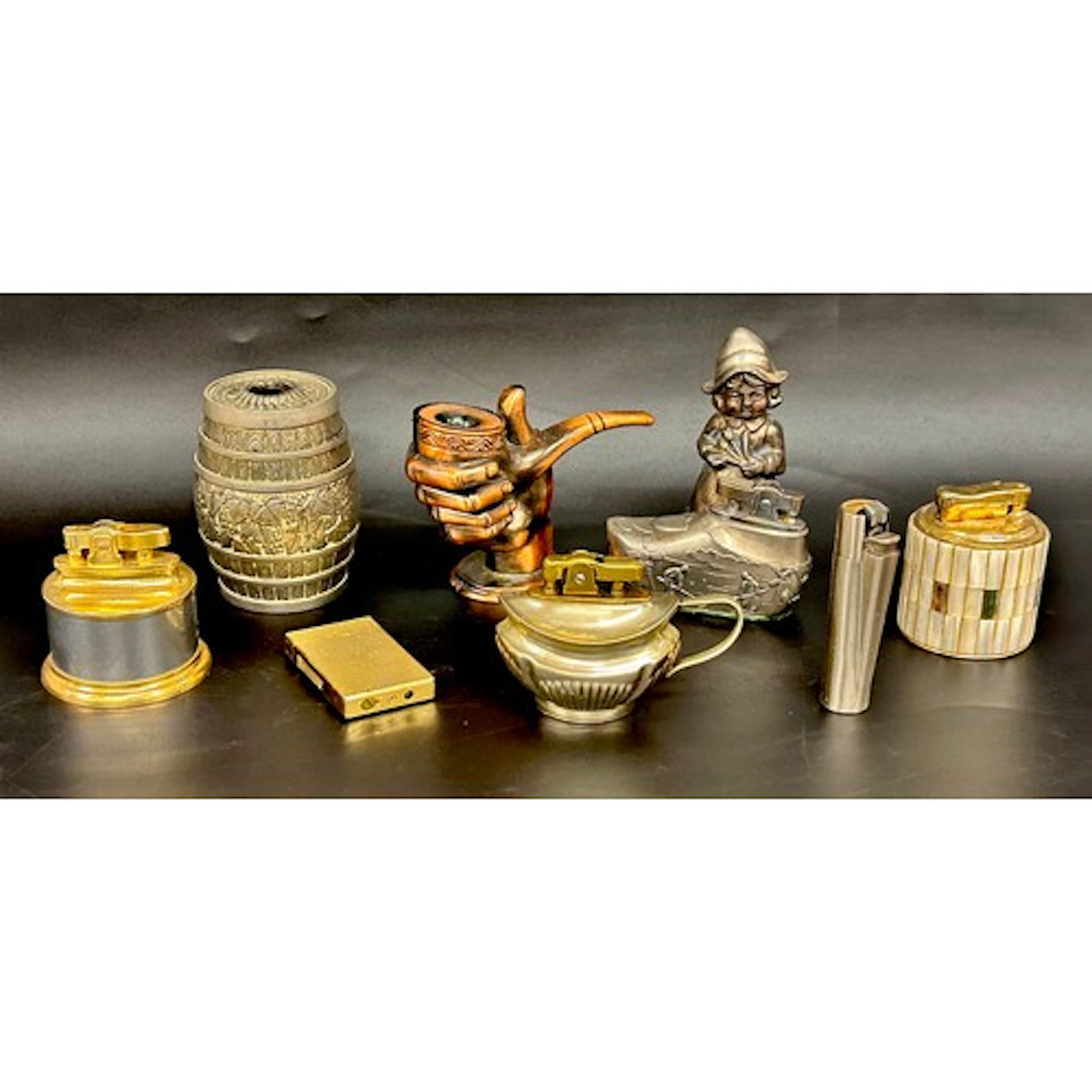 A collection of novelty table lighters, a/f *Not available f...