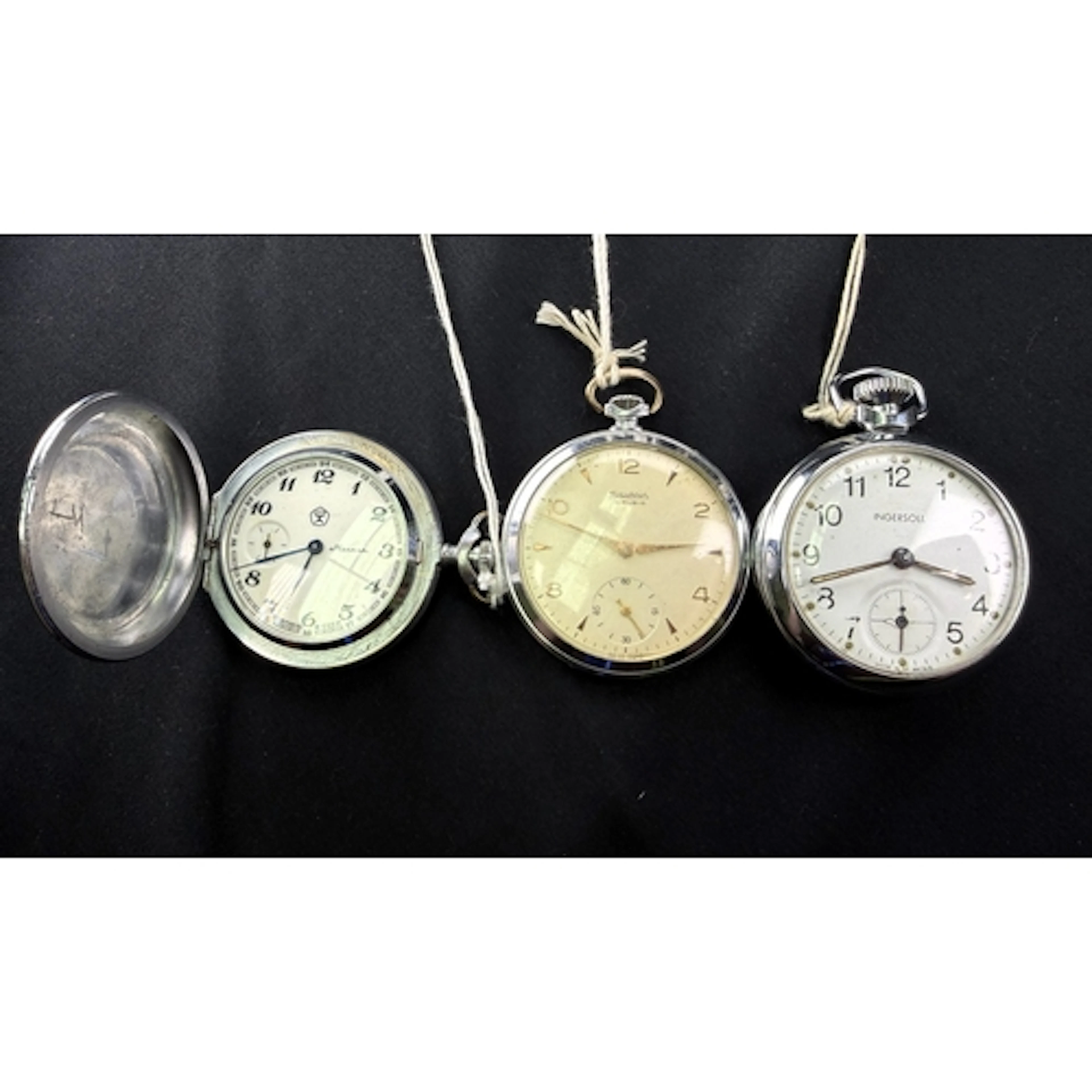 An open faced keyless pocket watch in stainless stell case b...