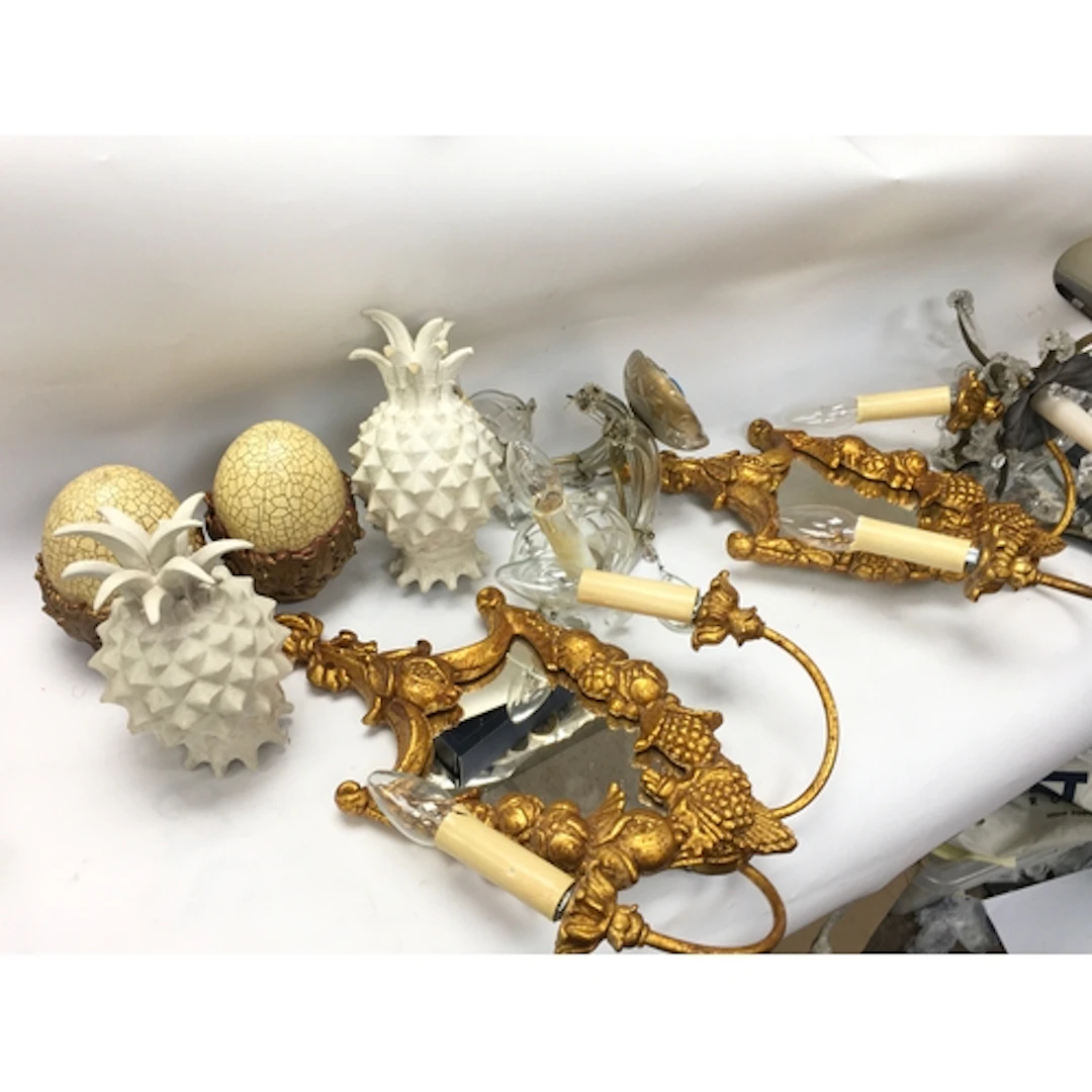 Interior design pieces including lights and curtain finials