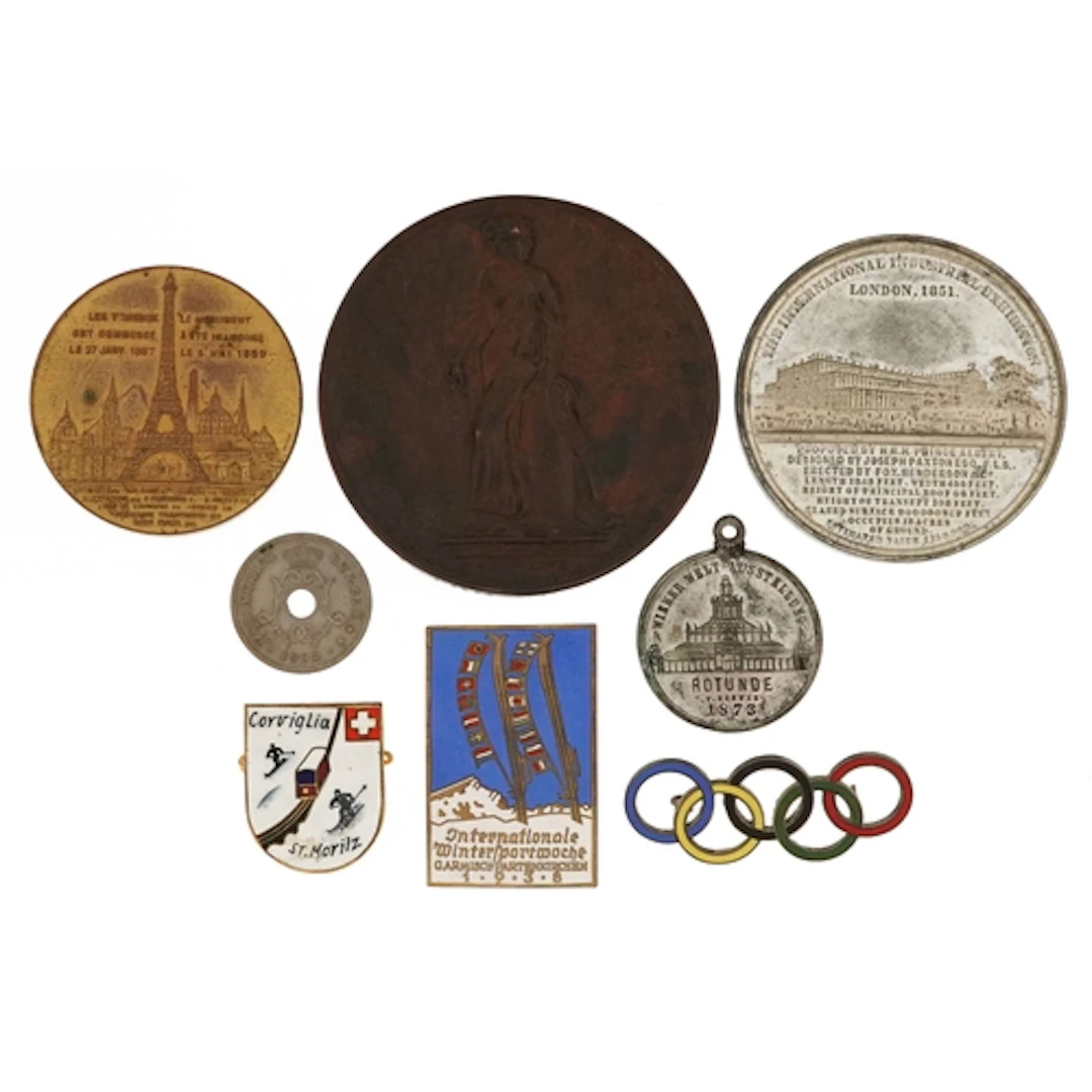 Commemorative medallions and badges including bronze Sir Wal...