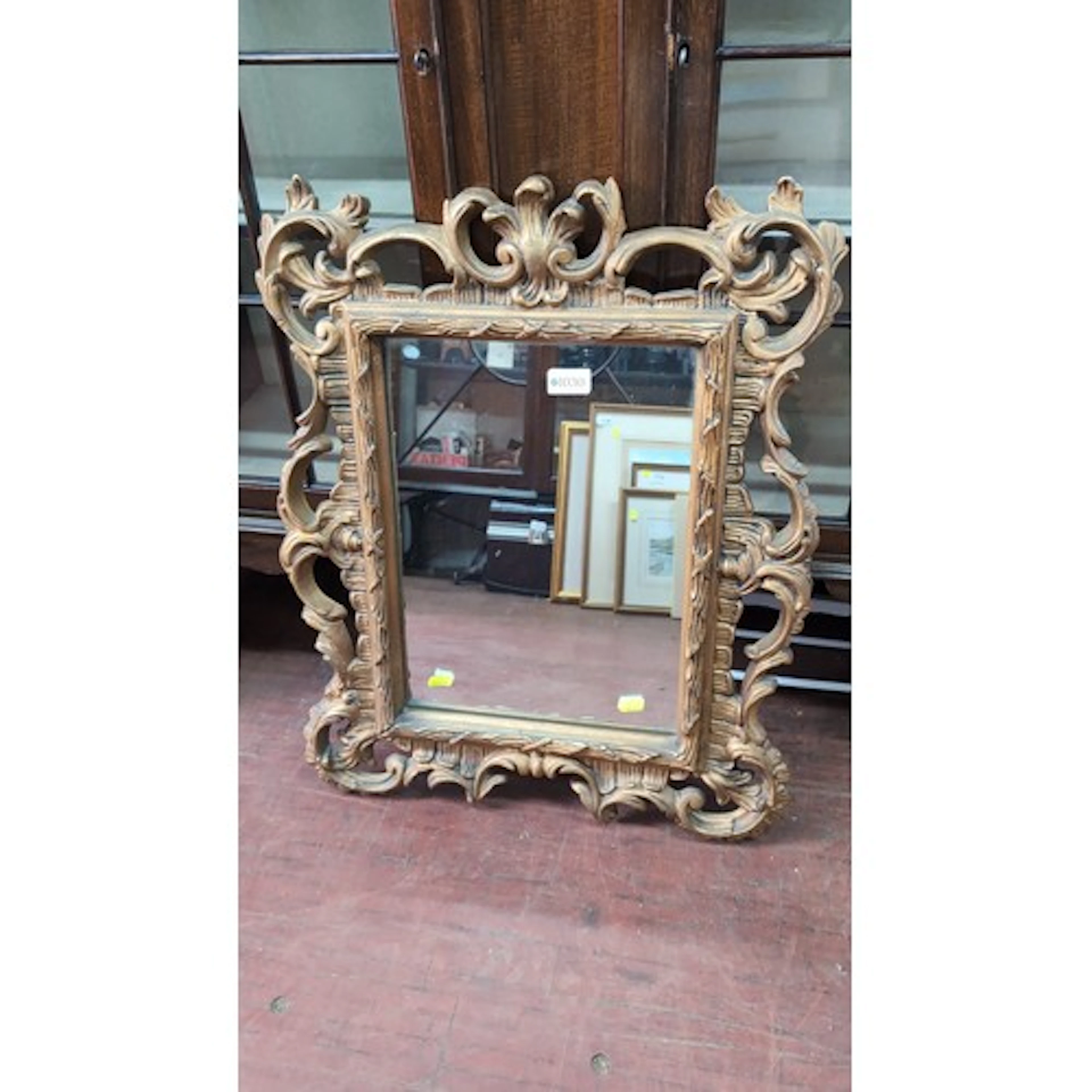 Rococo Revival wall mirror, the rectangular plate within a m...