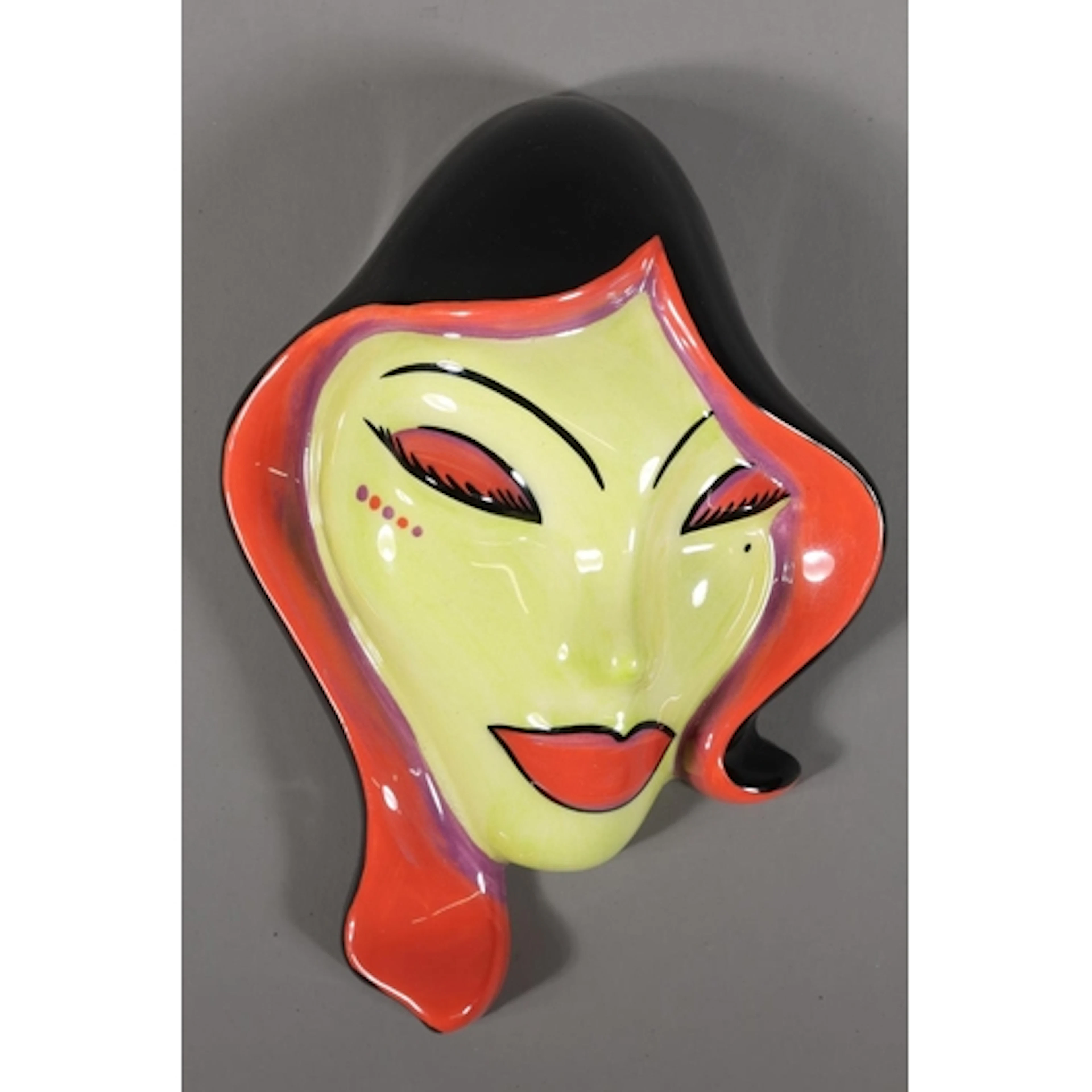 Old Ellgreave Pottery wall mask of a young lady, modelled by...