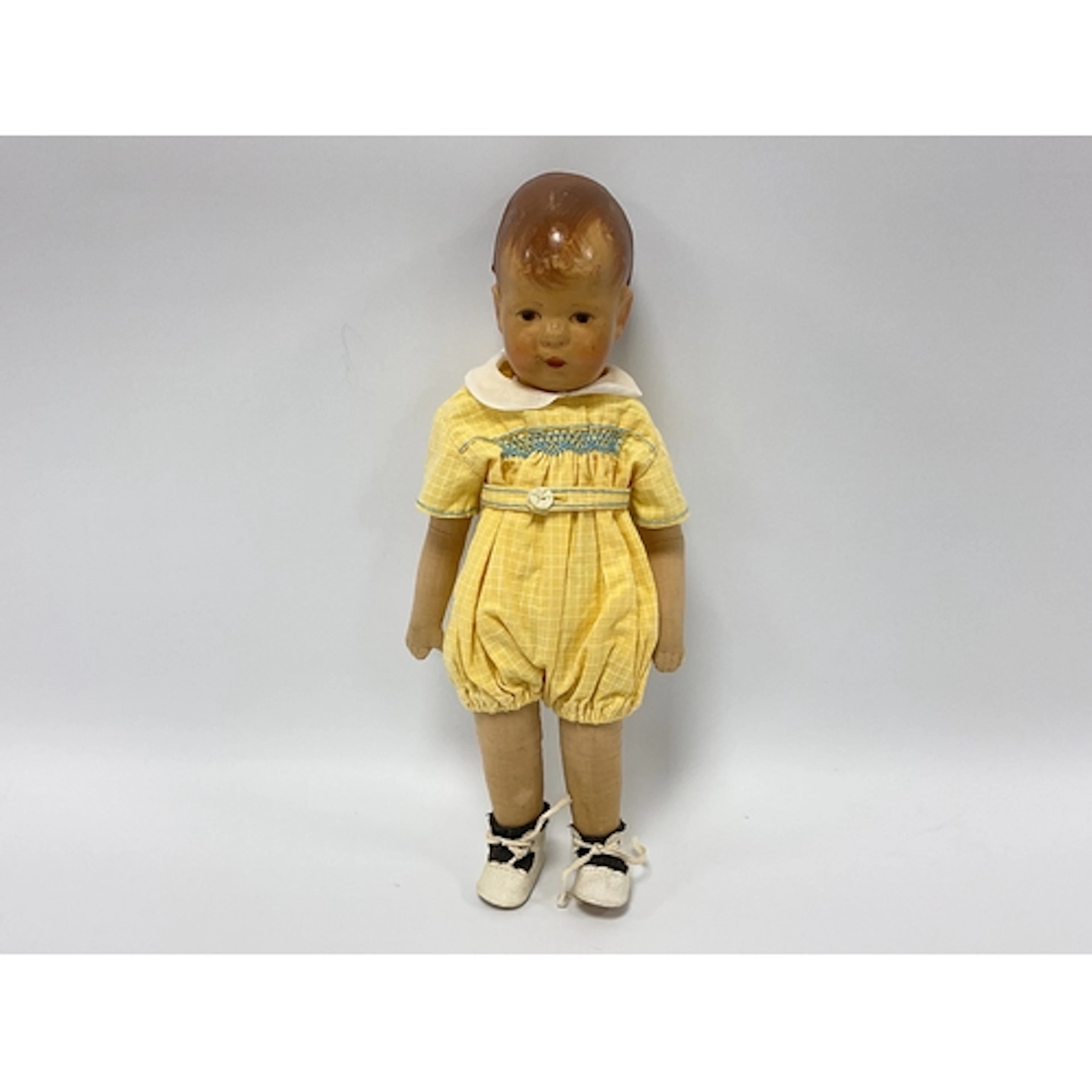 A Mid XX Century Kathe Kruse Doll, with painted swivel head,...
