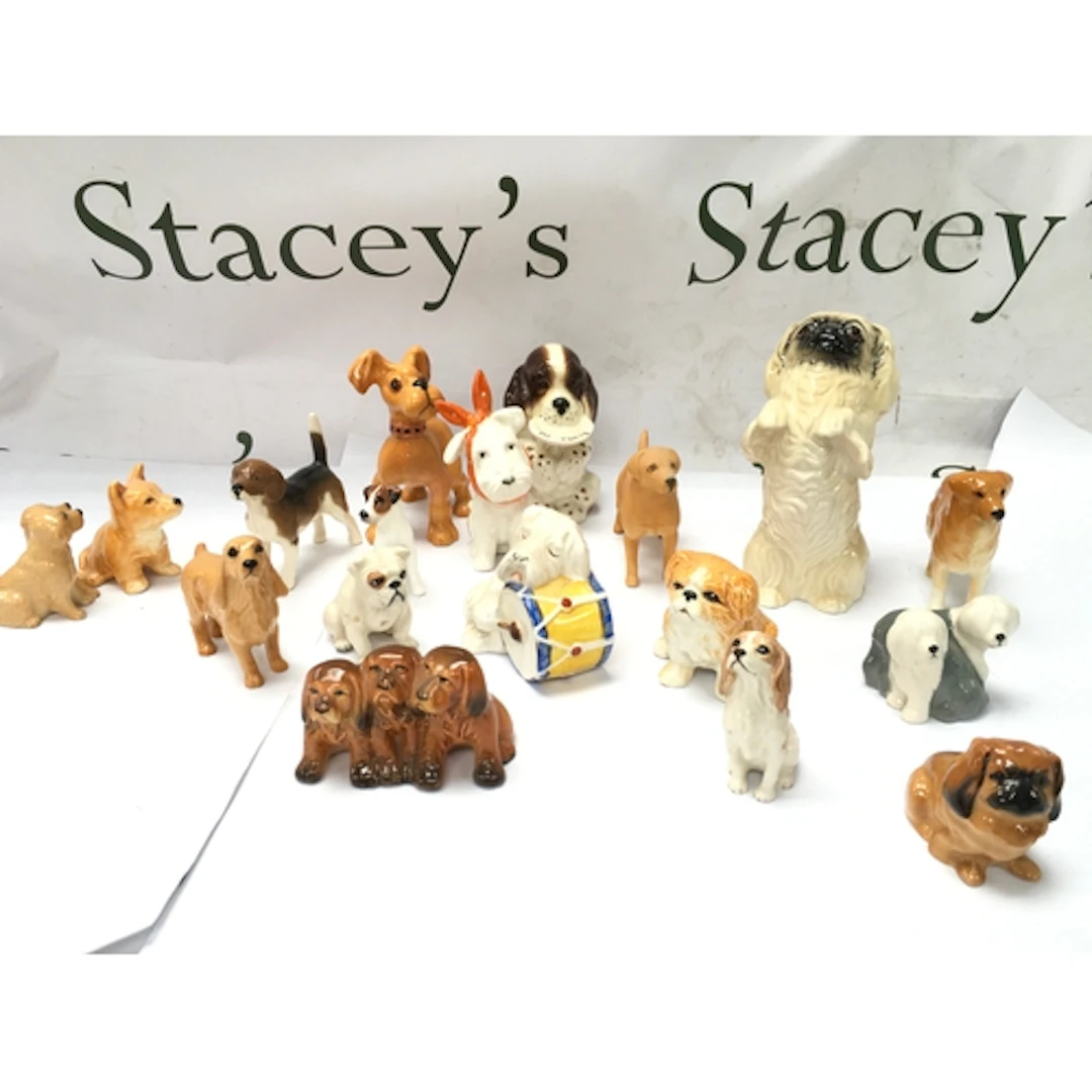 porcelain dog figurines by beswick and Royal Doulton, includ...