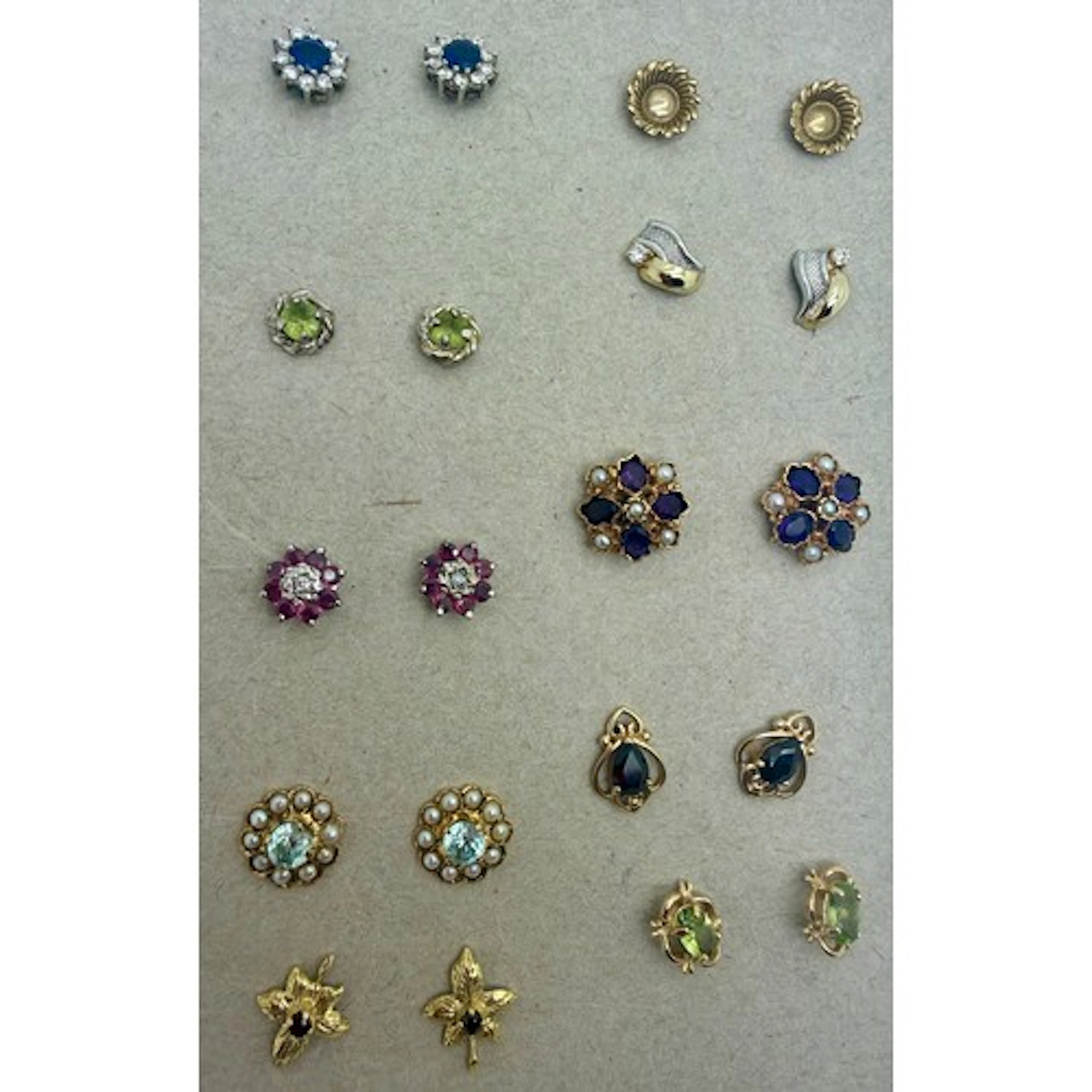 Ten pairs of gem set and gold earrings to include 18 carat s...