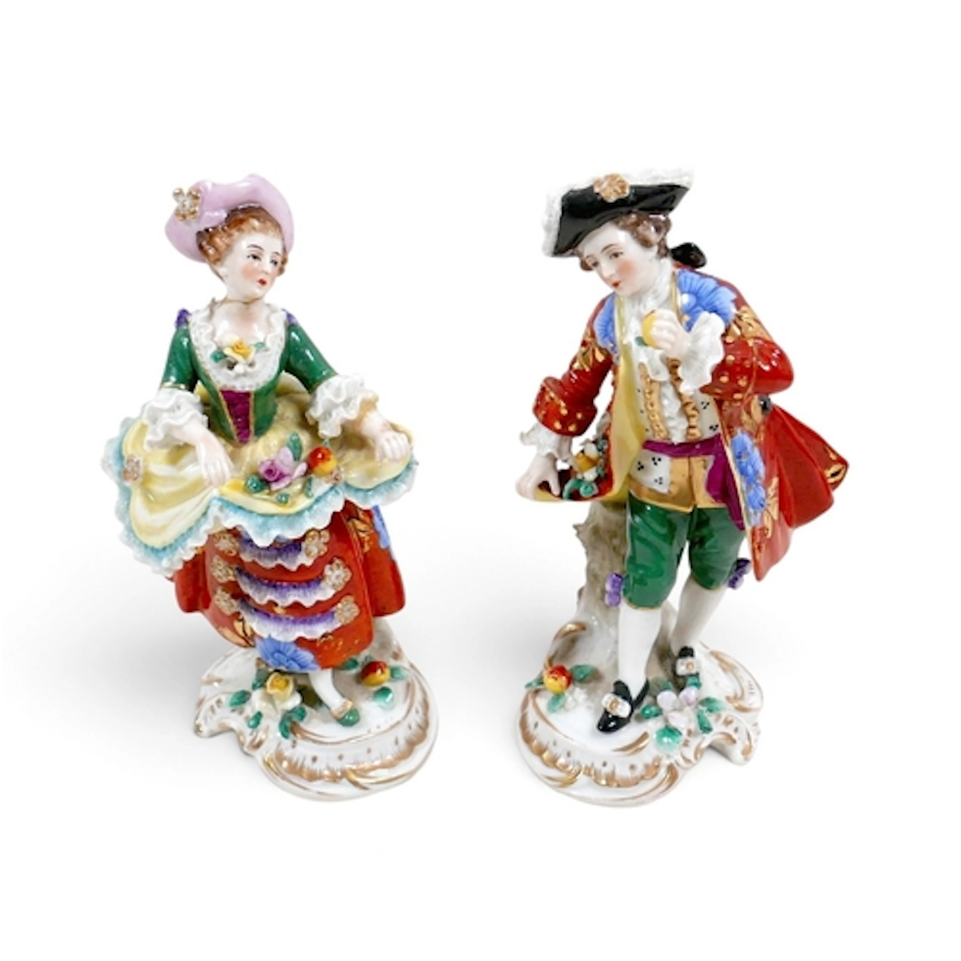 A PAIR OF 19TH CENTURY PORCELAIN FIGURES. modelled as a lady...