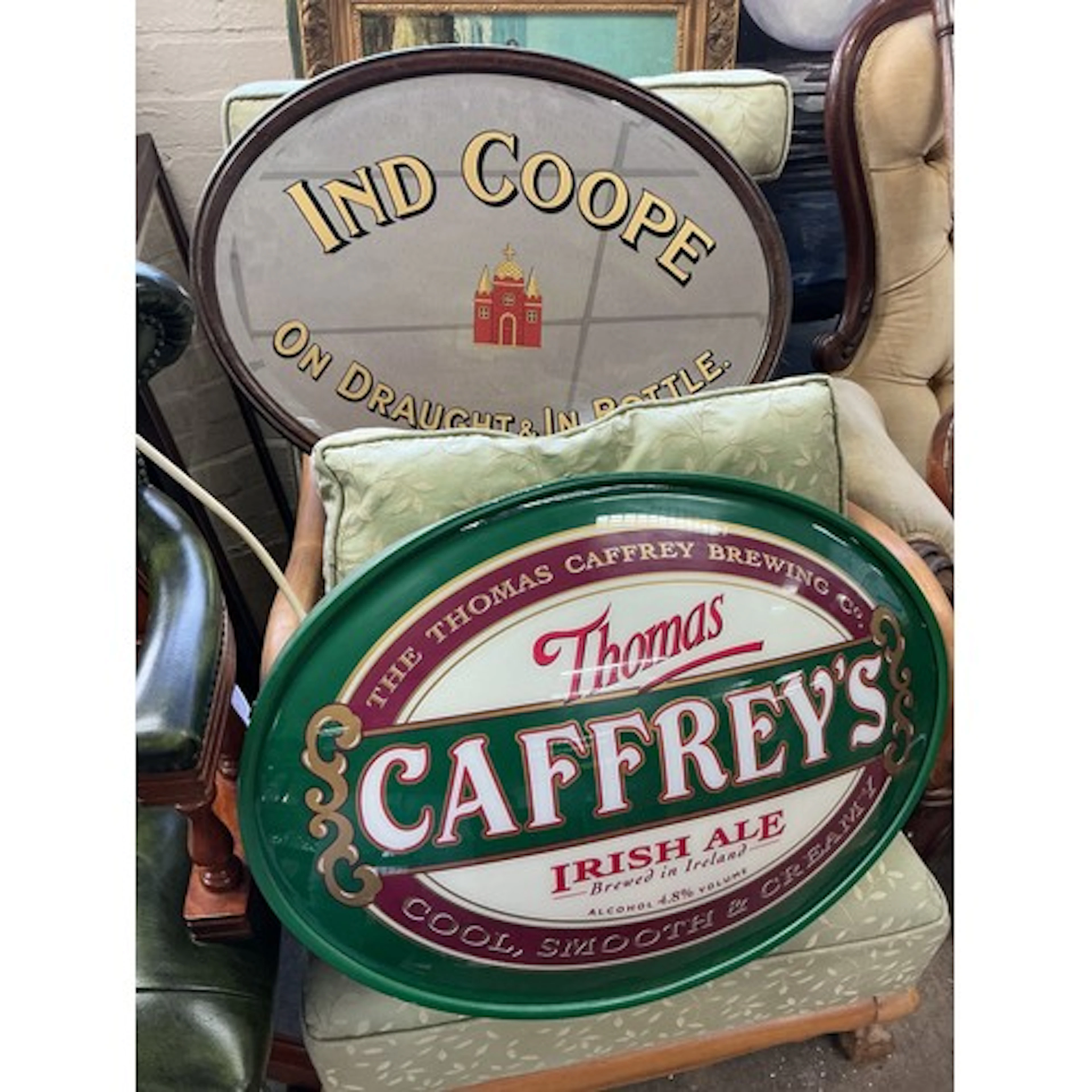 A collection of breweriana items comprising a Caffreys illum...