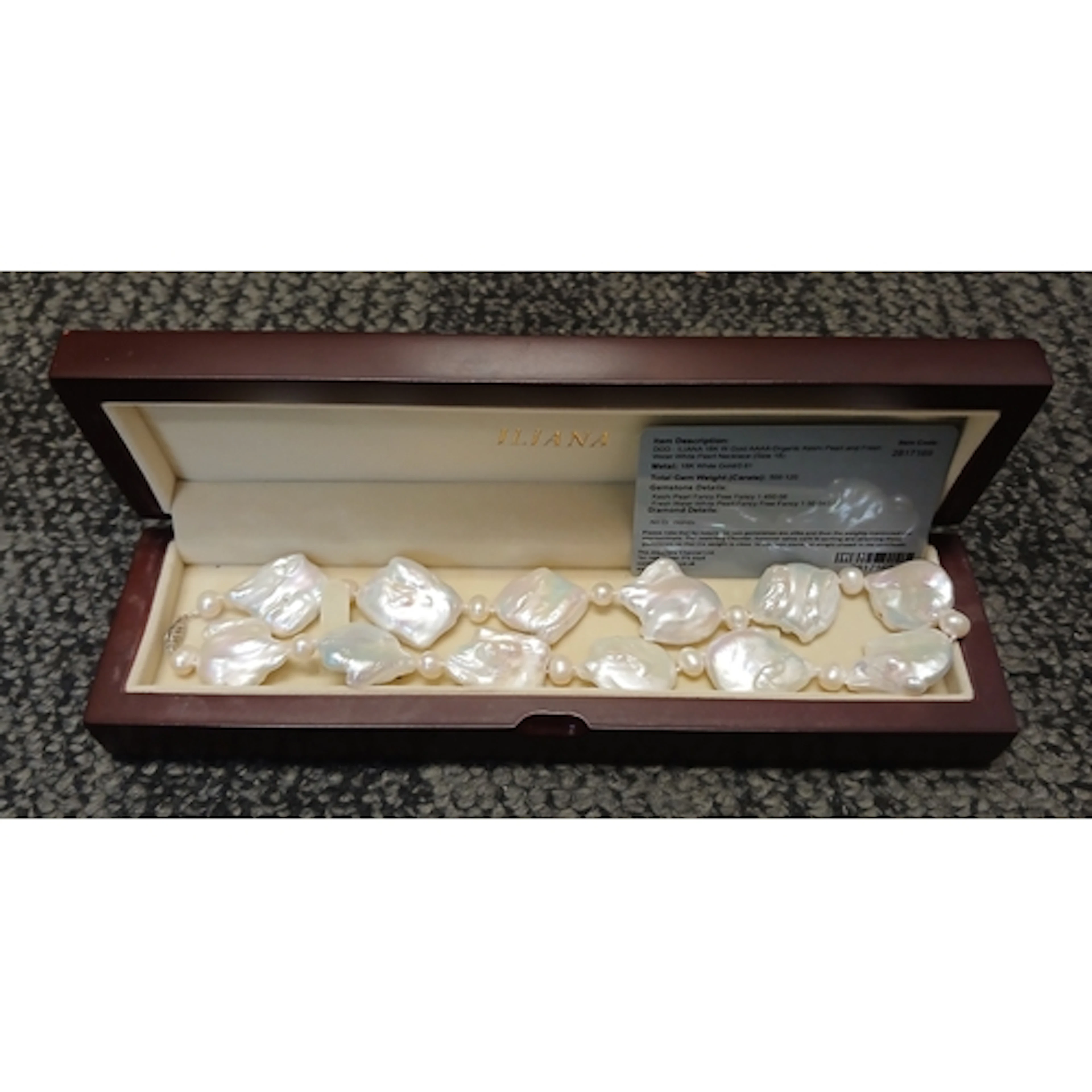 A keshi pearl necklace, white metal clasp marked '750', leng...